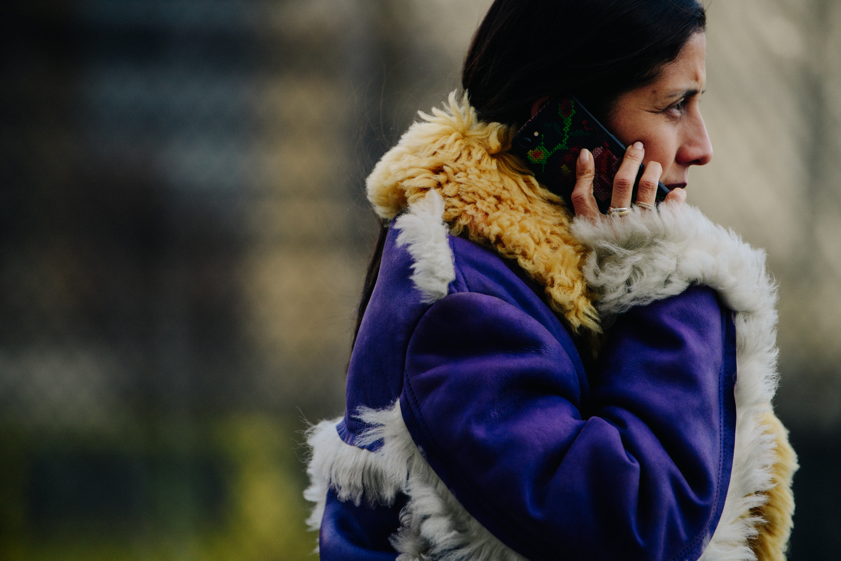 Woman wearing purple fur coat