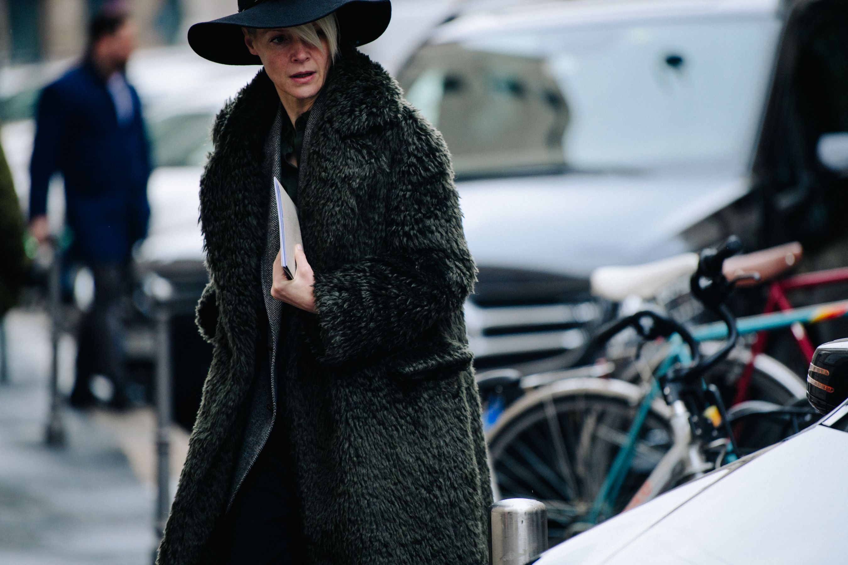 Woman wearing grey fur coat