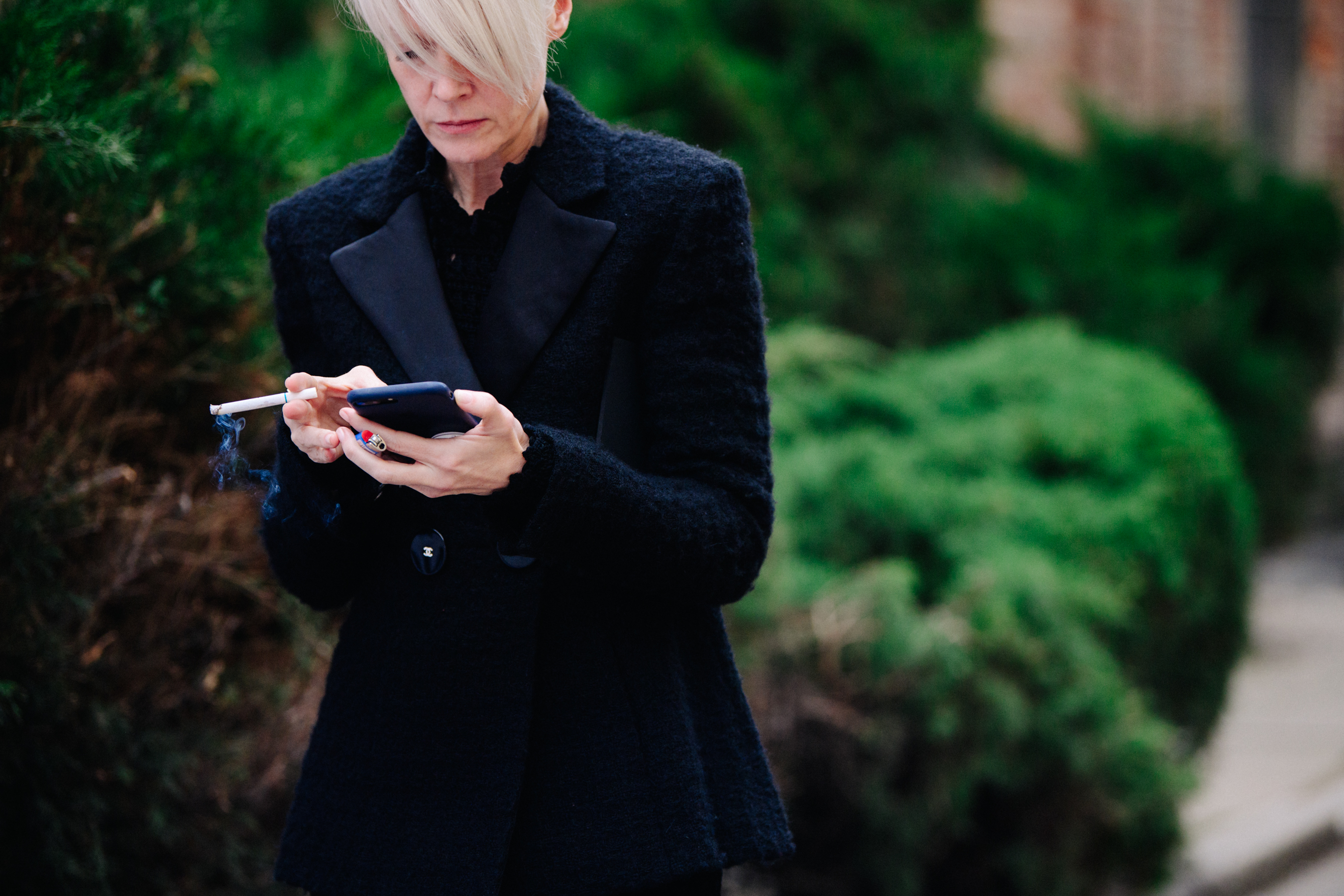 Woman wearing Chanel suit