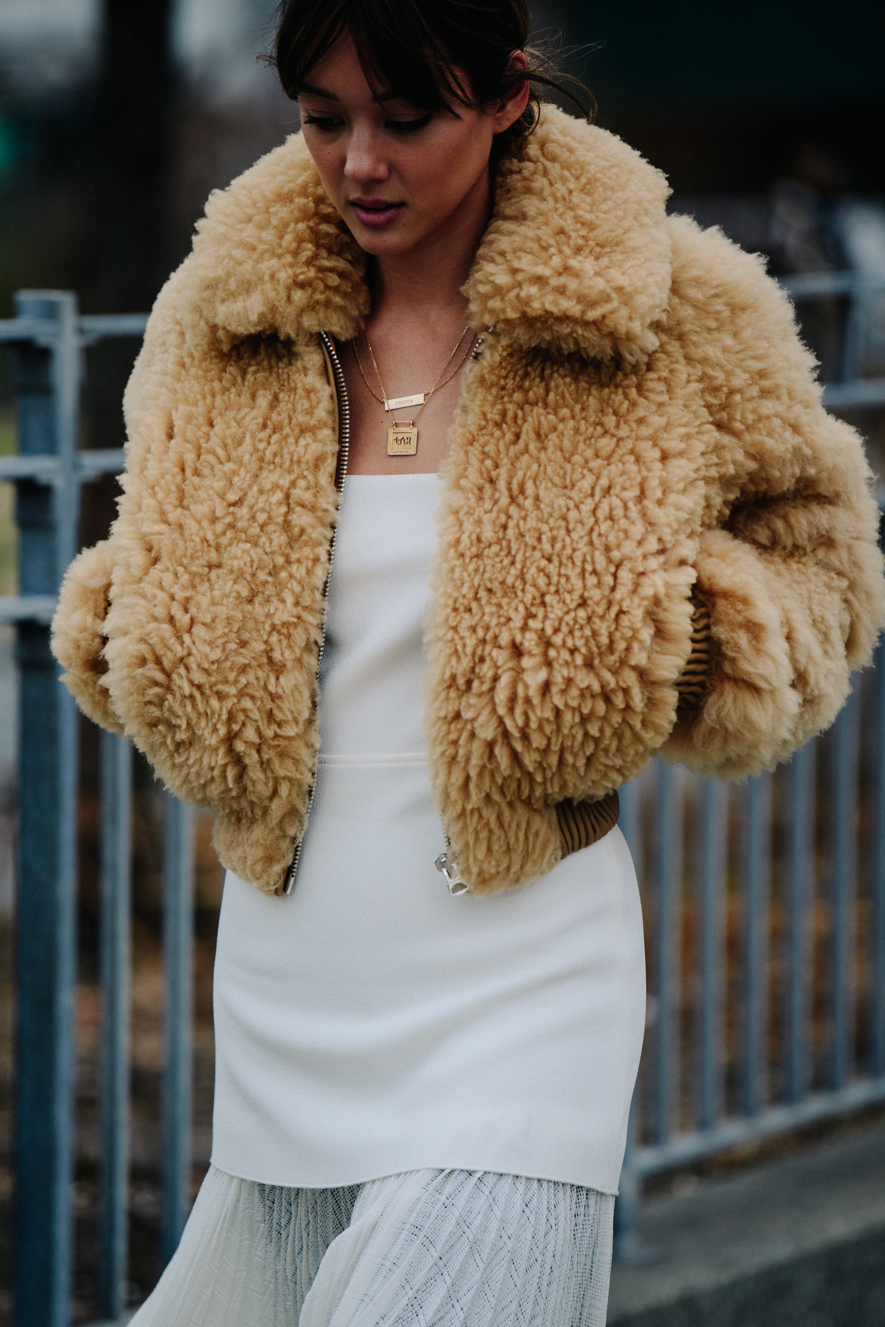 Blogger wearing white dress