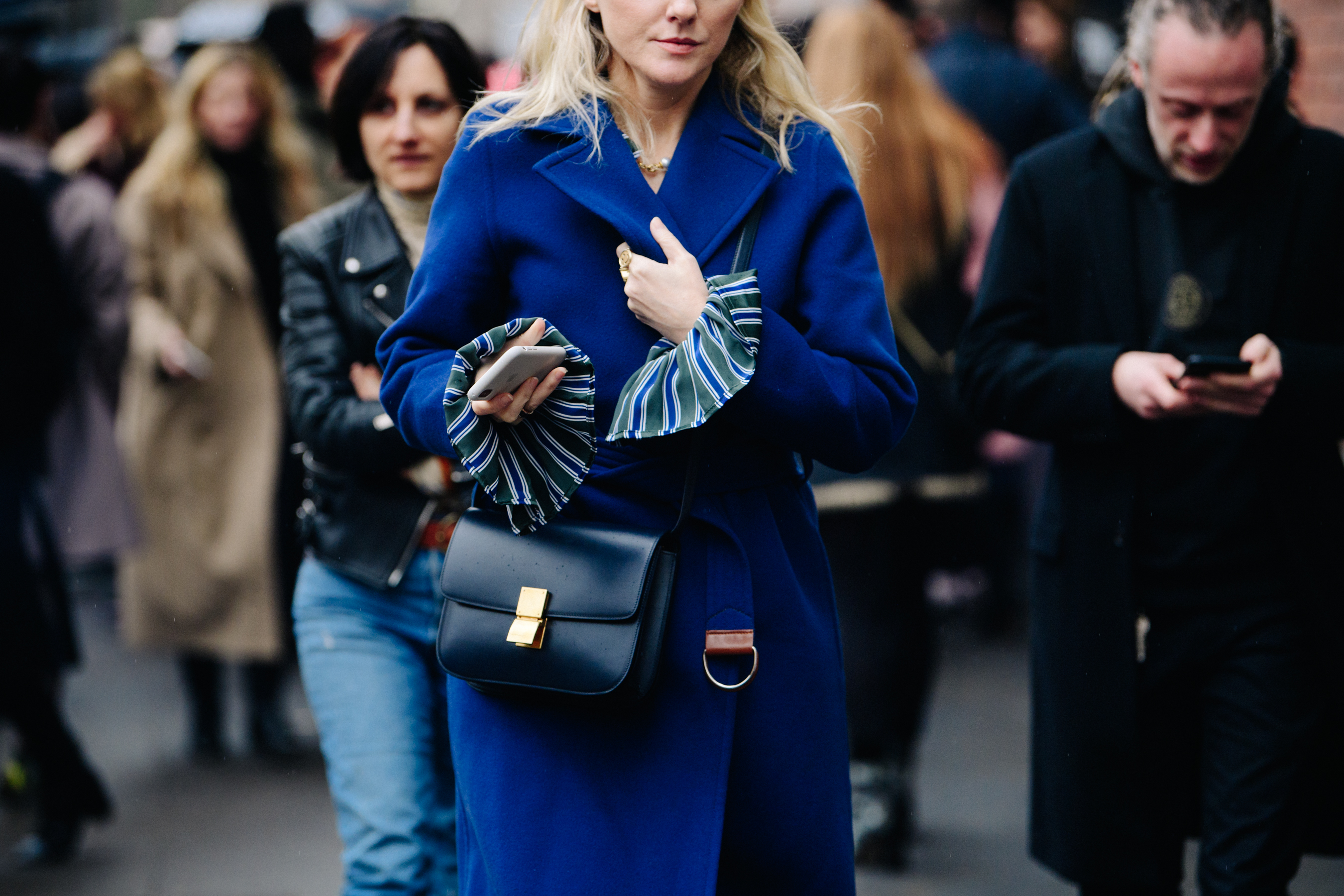 Woman wearing blue wool coat