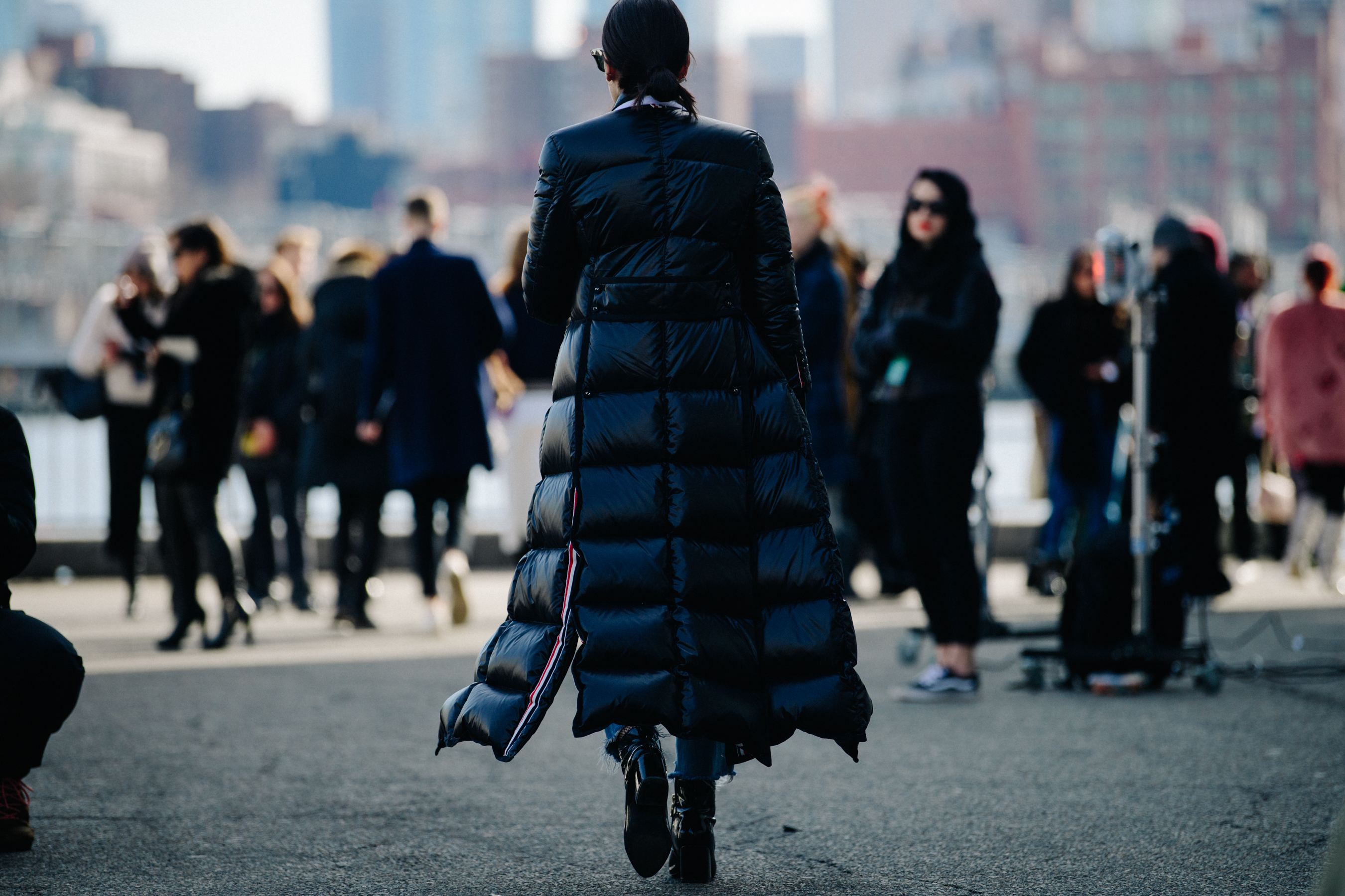 Woman wearing long puffer coat