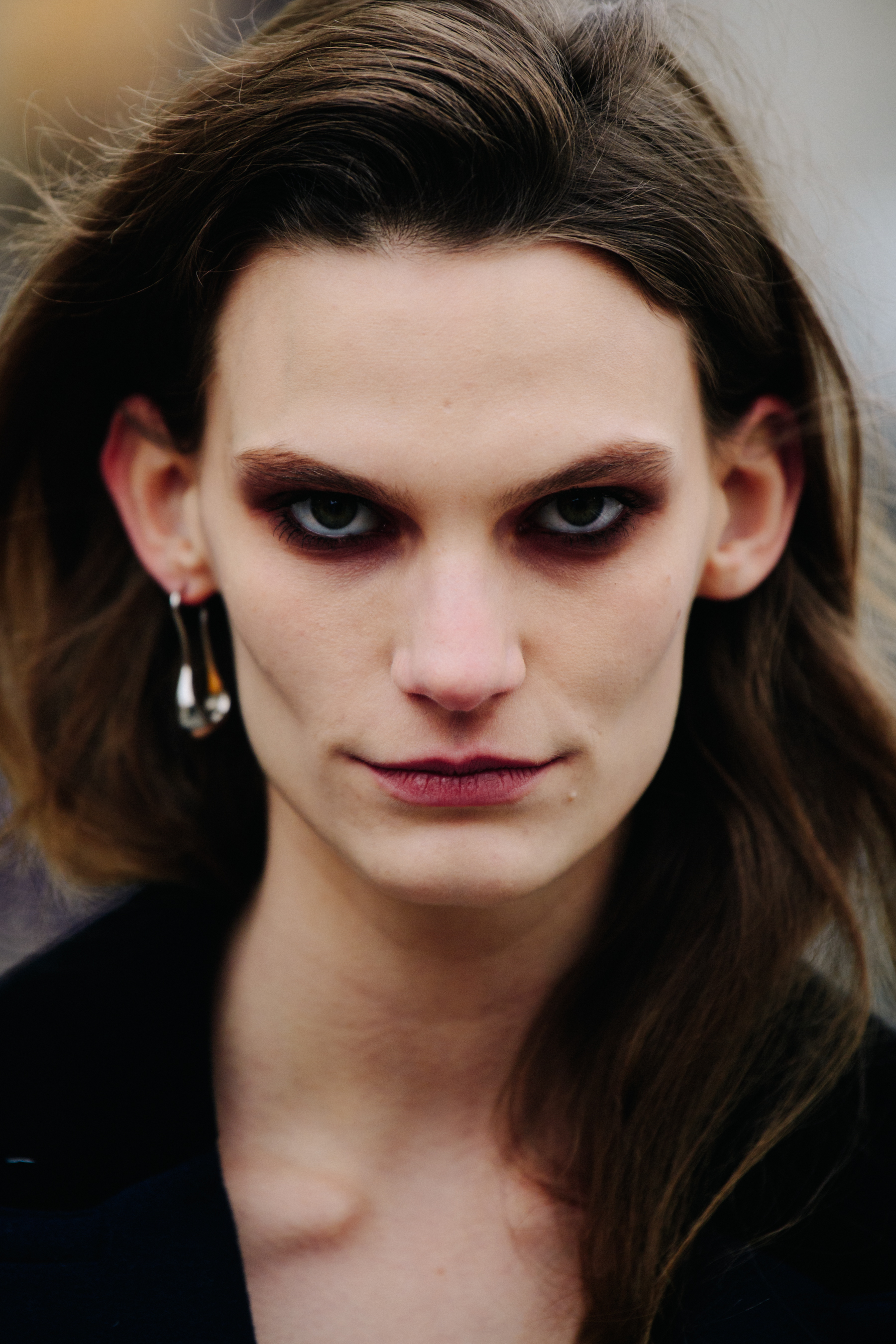 Portrait of Lena Hardt with dark eye makeup