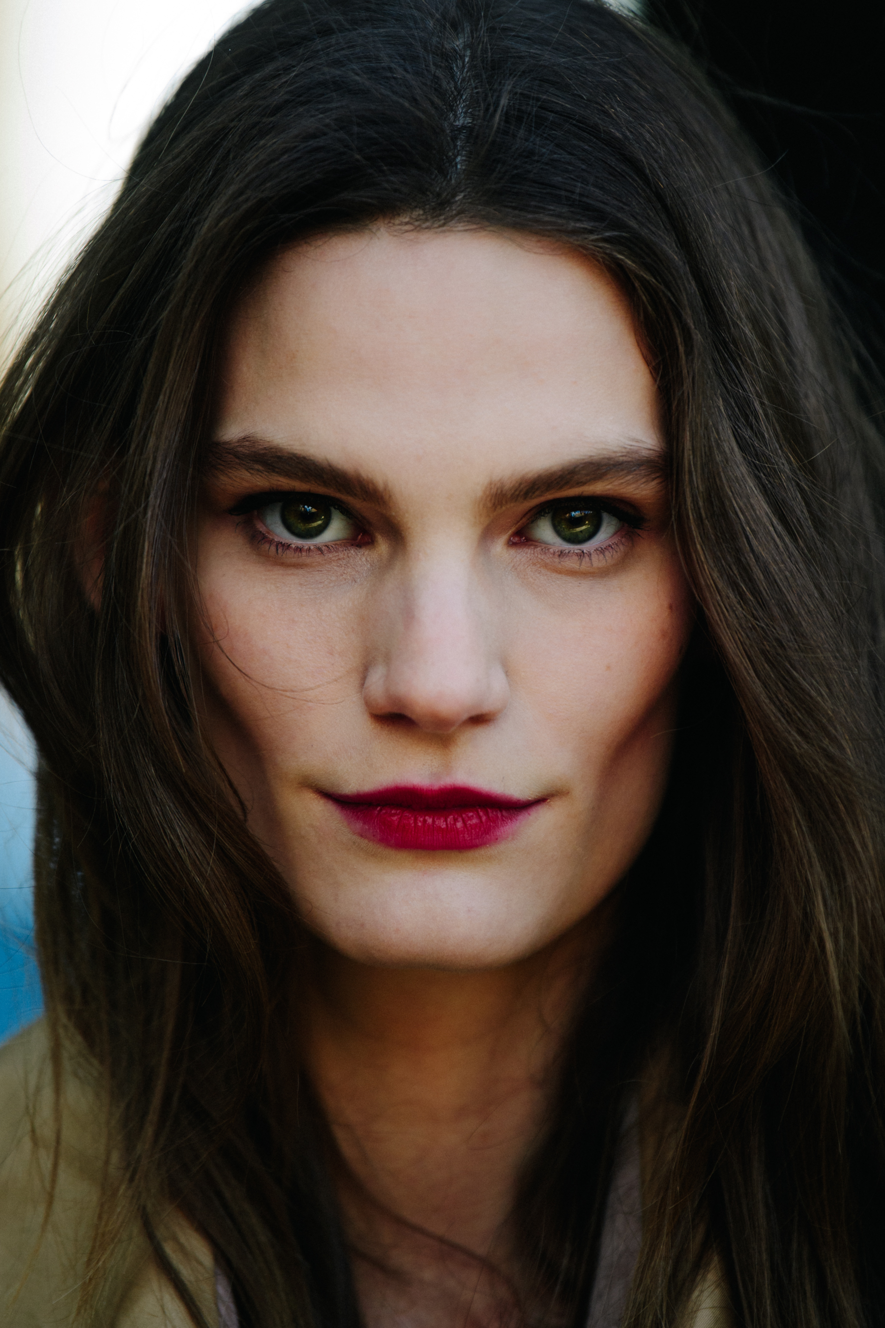 Portrait of German model wearing red lipstick