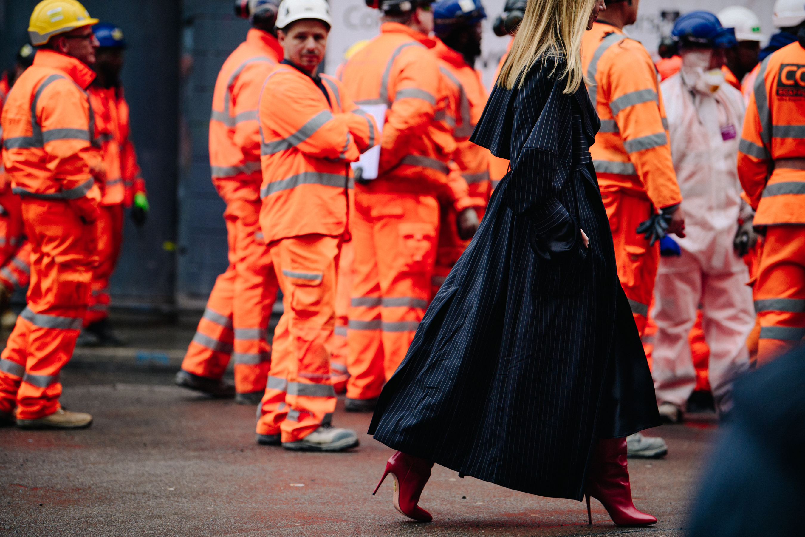 Woman wearing red leather boots