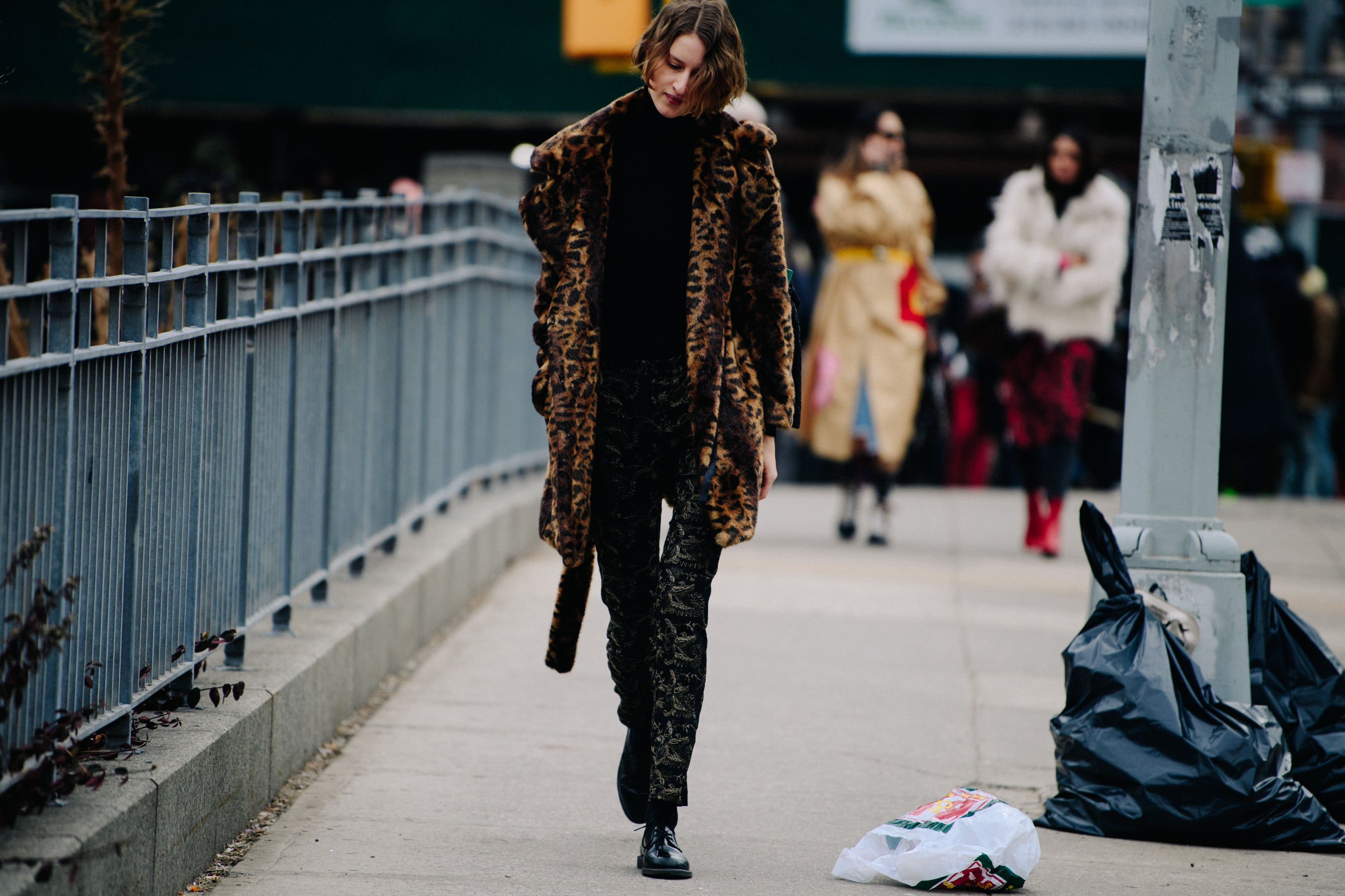 Model wearing leopard print coat