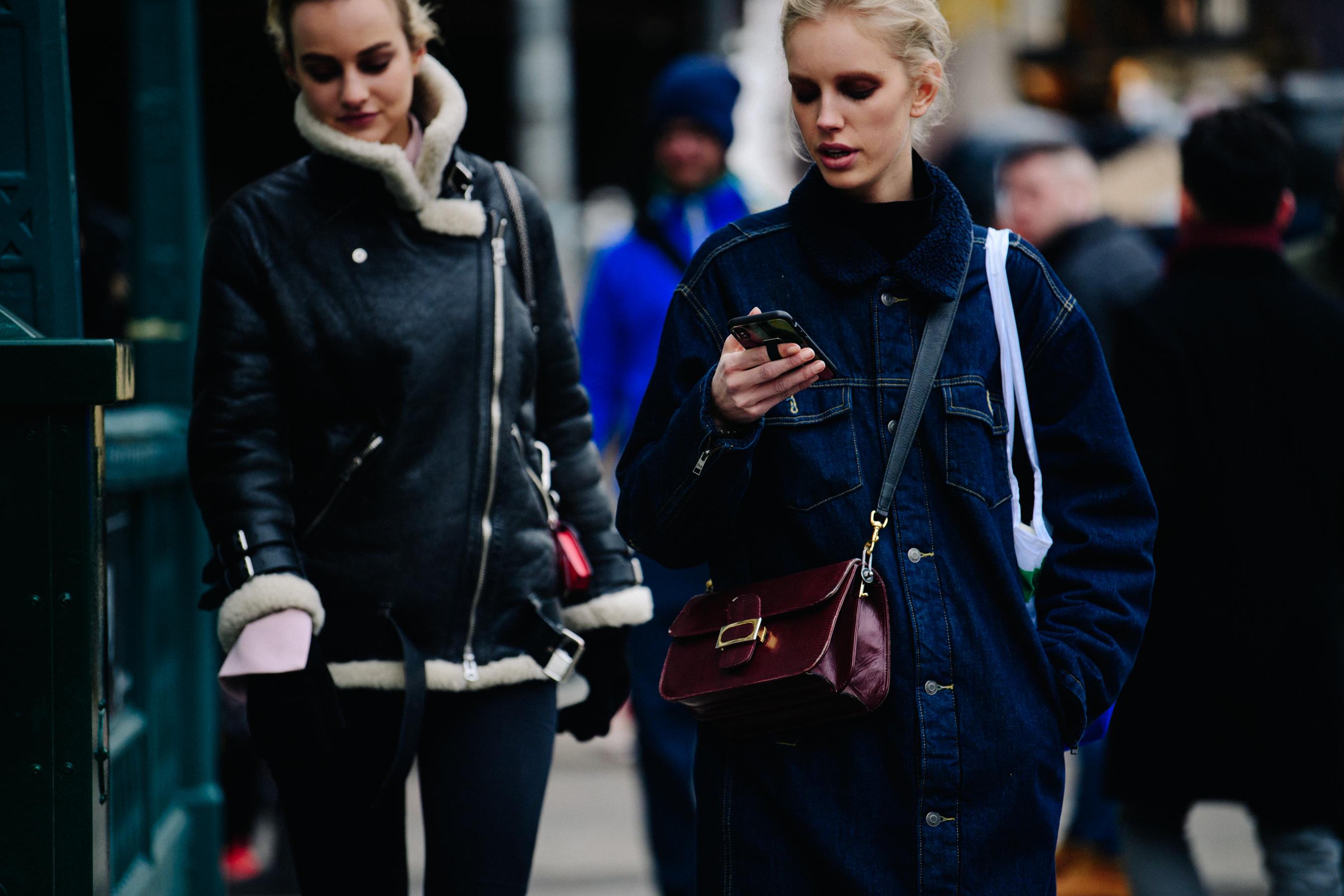 Two Dutch models wearing winter coats