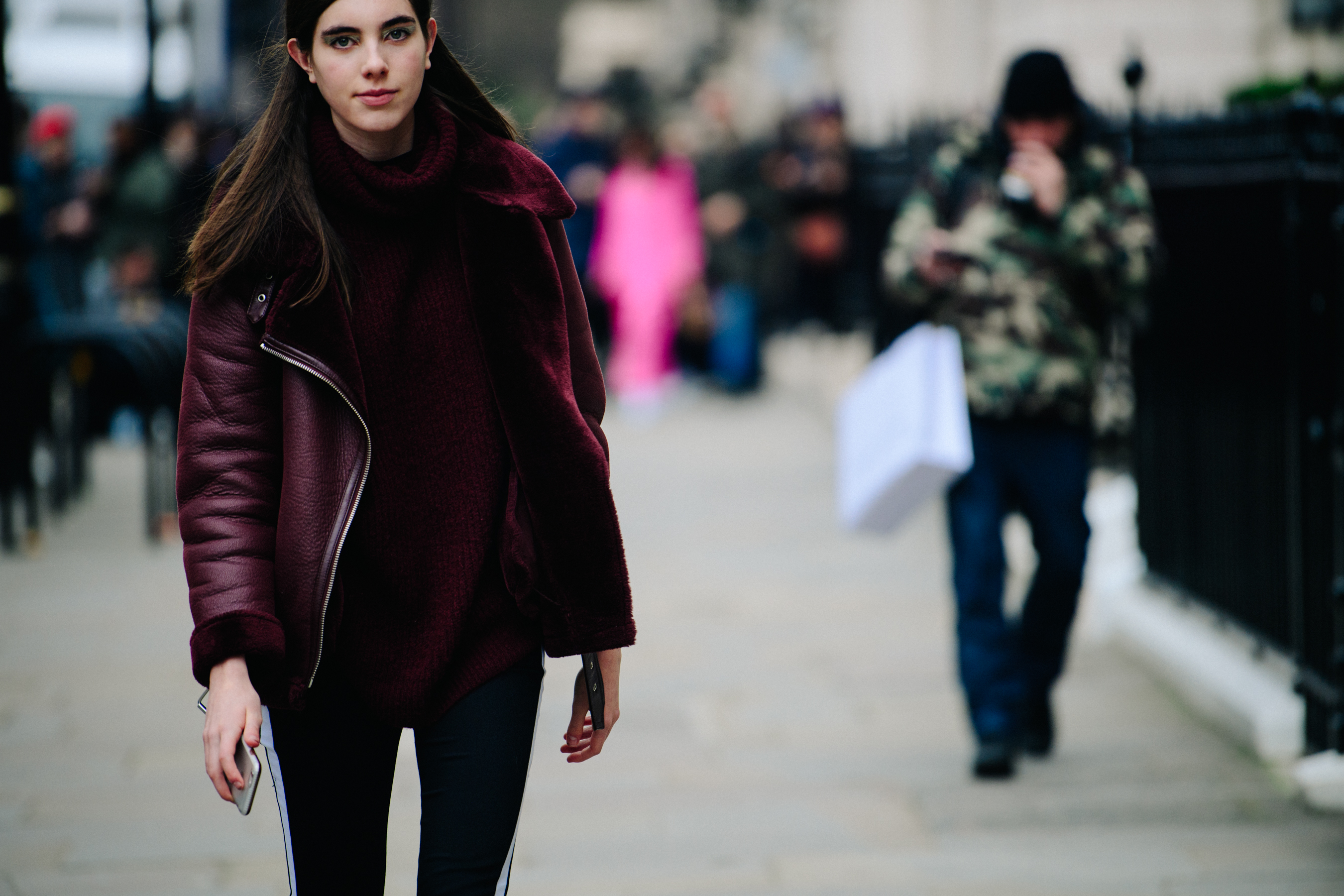 British model wearing red jacket