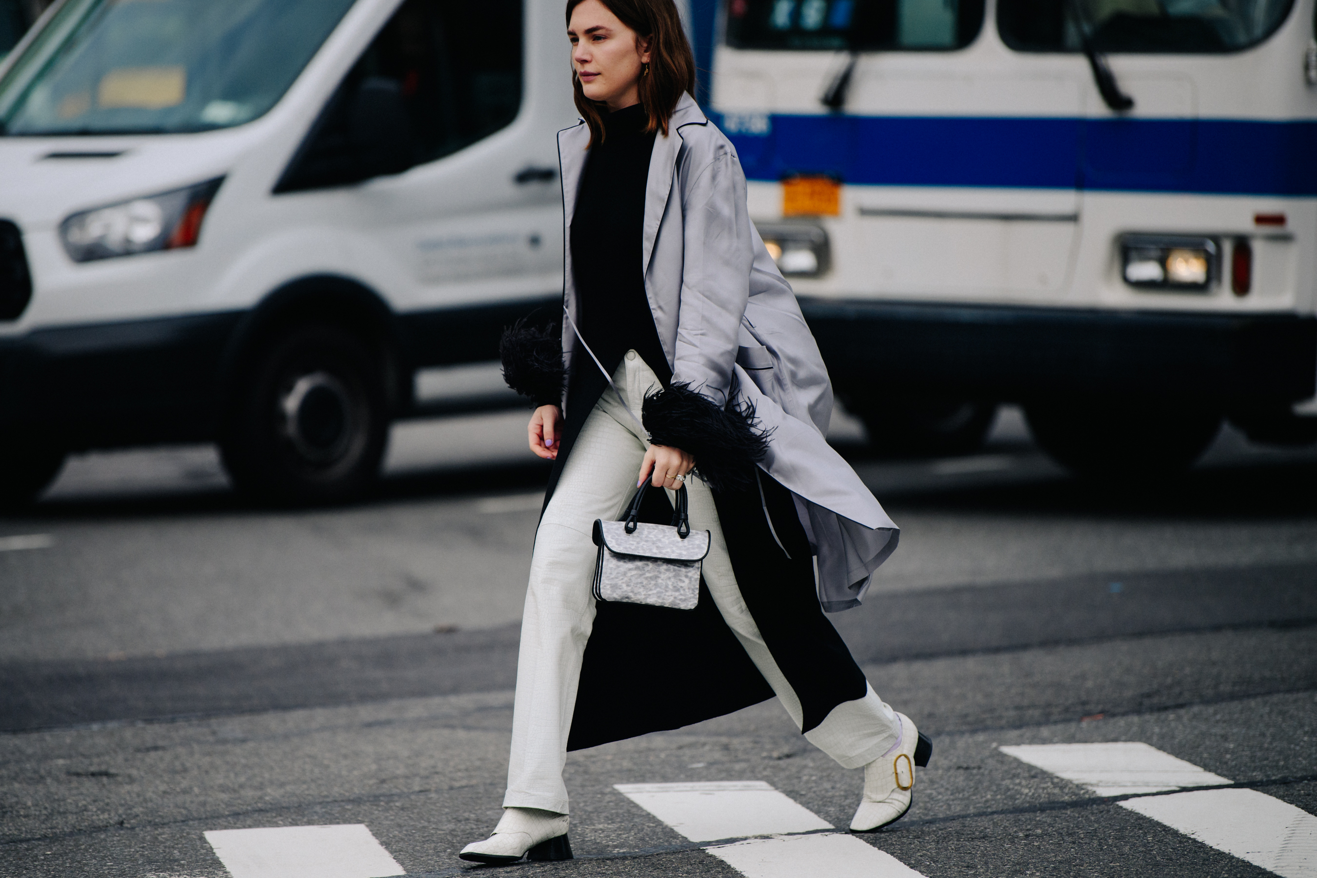 Woman wearing long grey coat