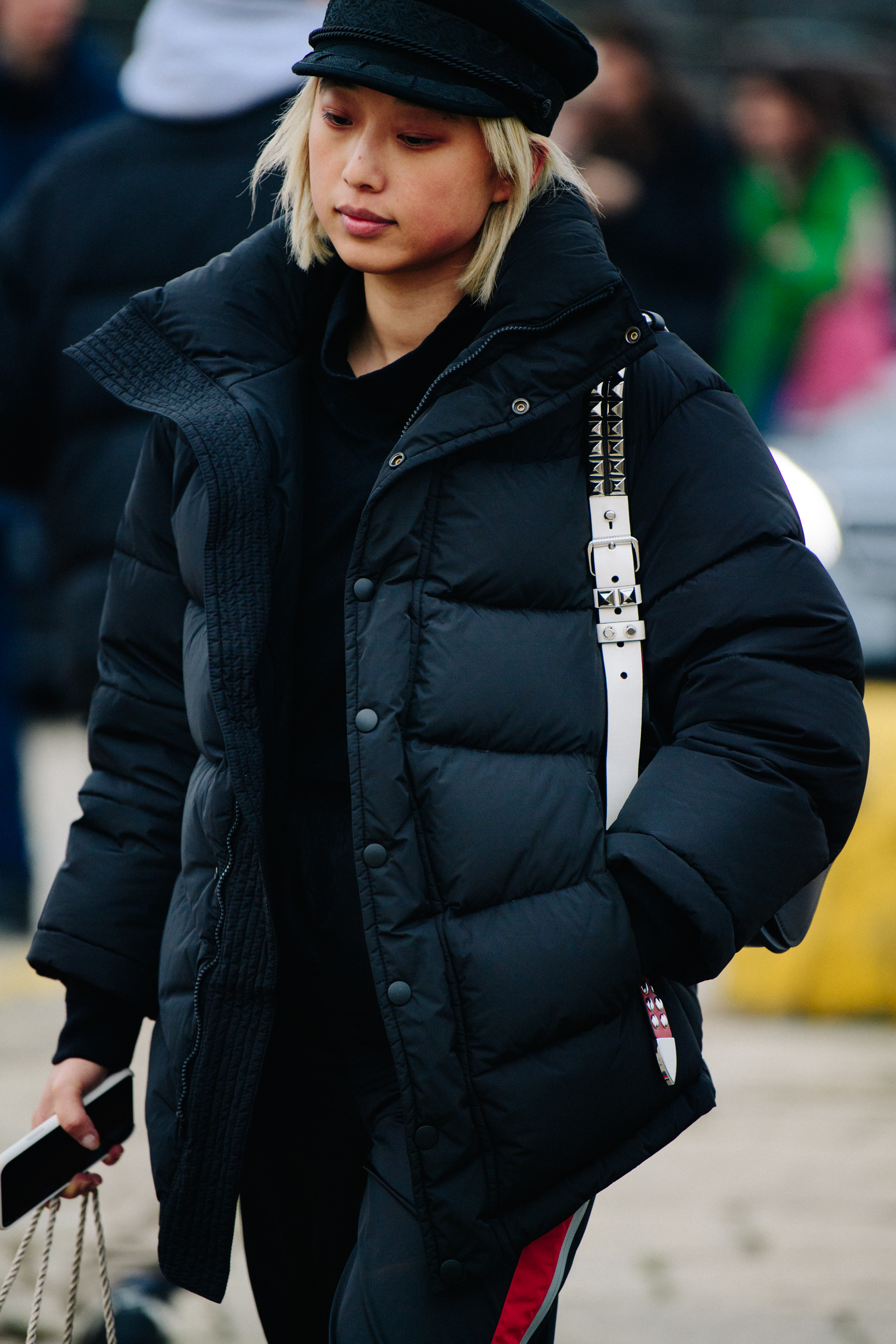 Asian blogger wearing black hat