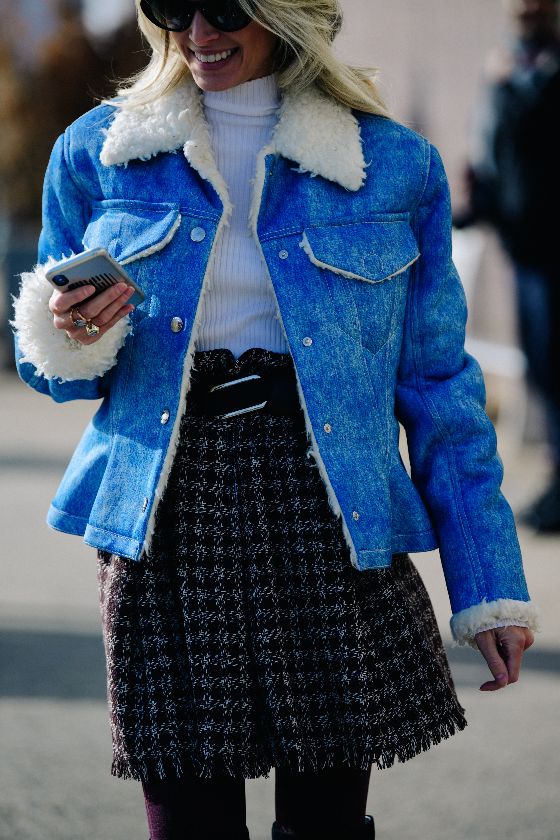 Woman wearing blue denim jacket