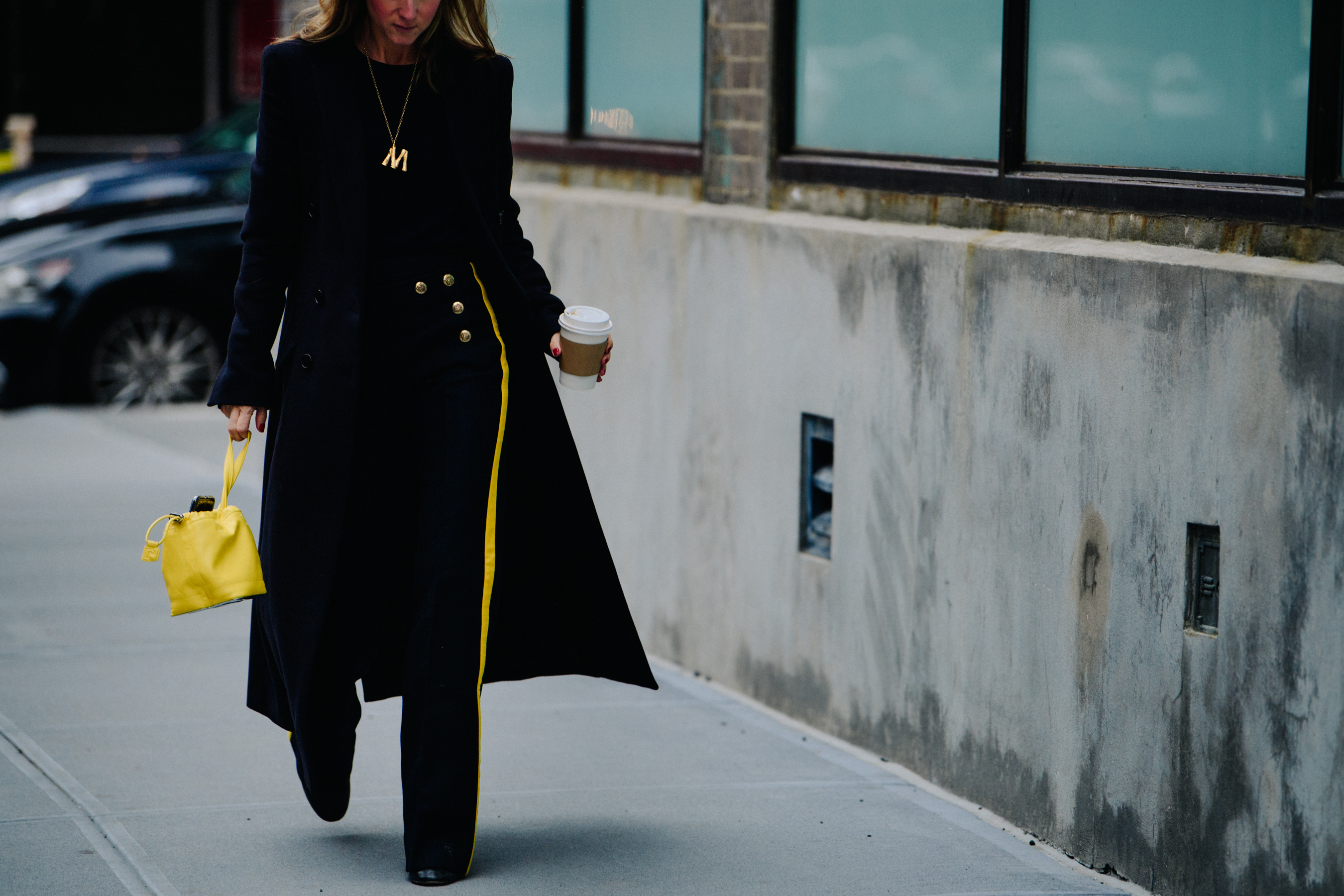 Woman wearing yellow stripe pants
