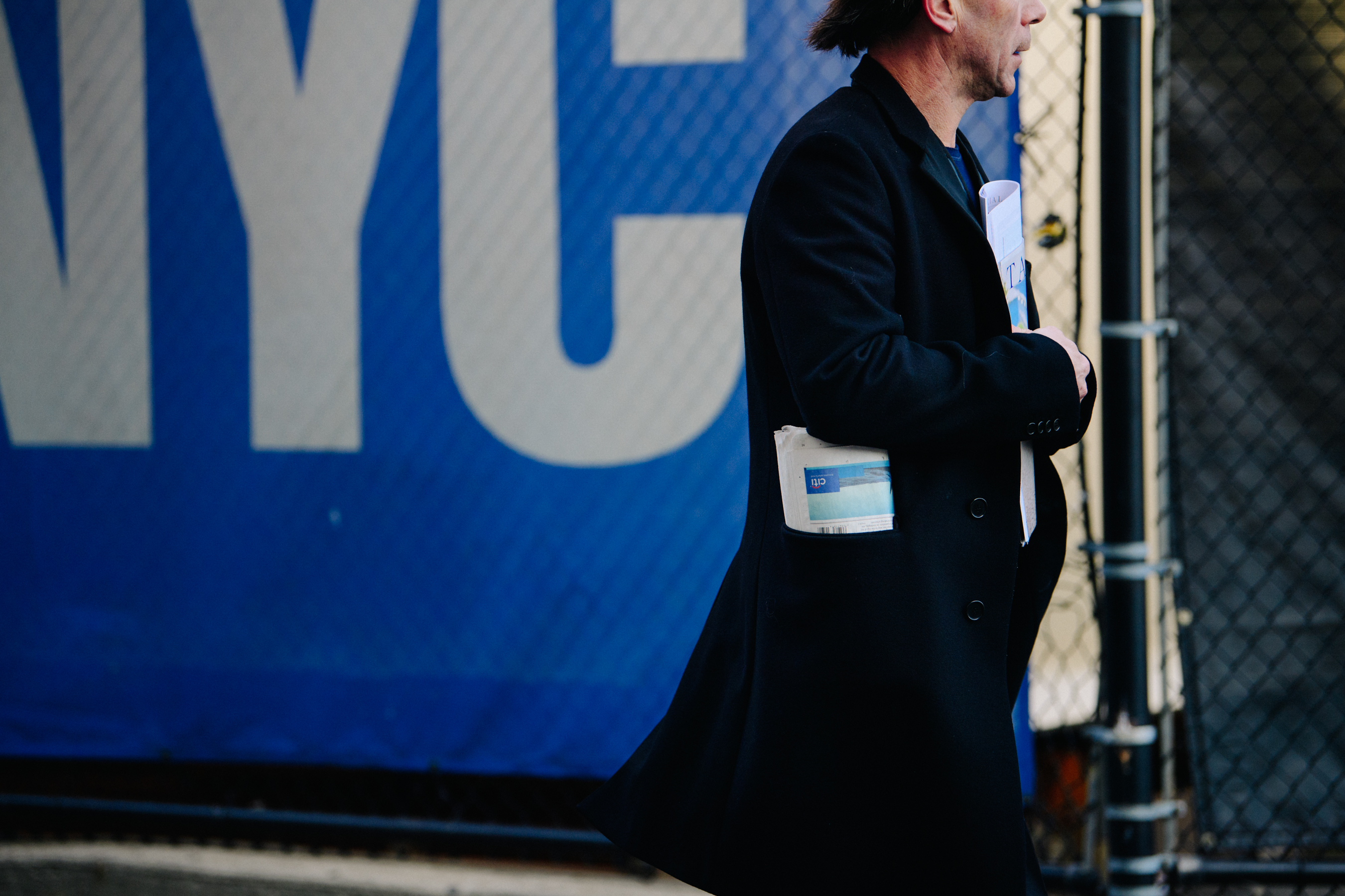 Man wearing blue wool coat