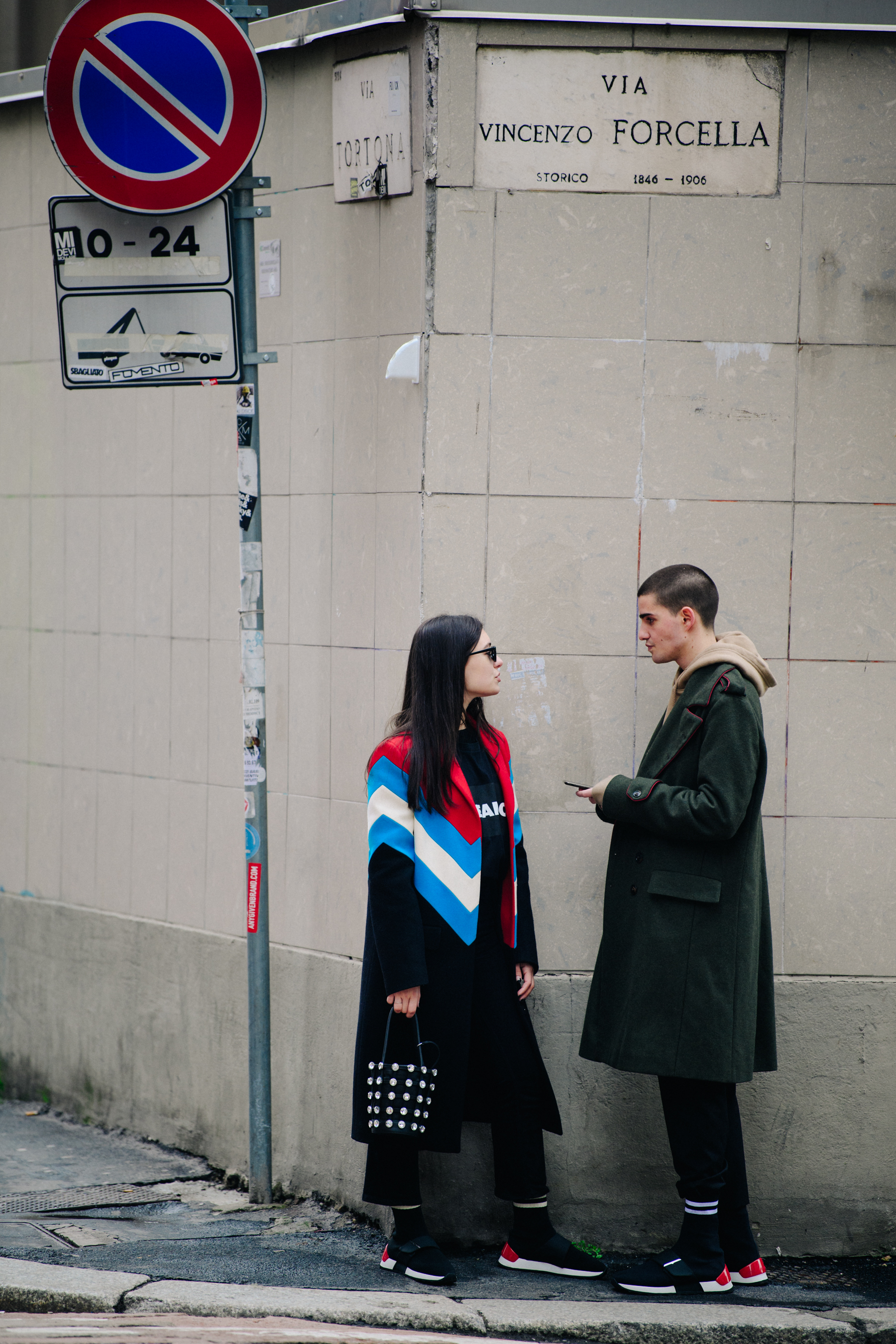 Couple wearing matching sneakers