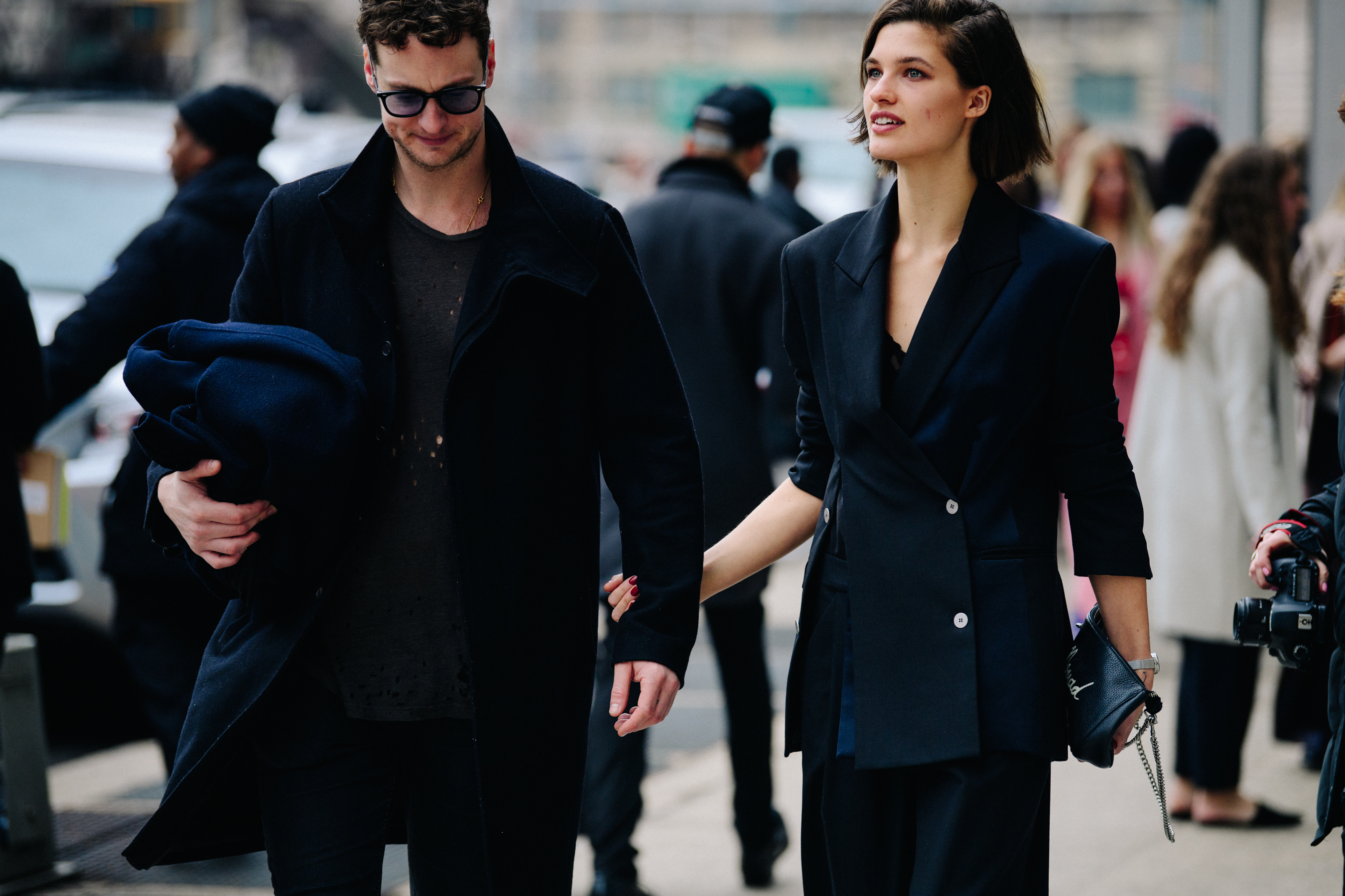 Model couple wearing all black