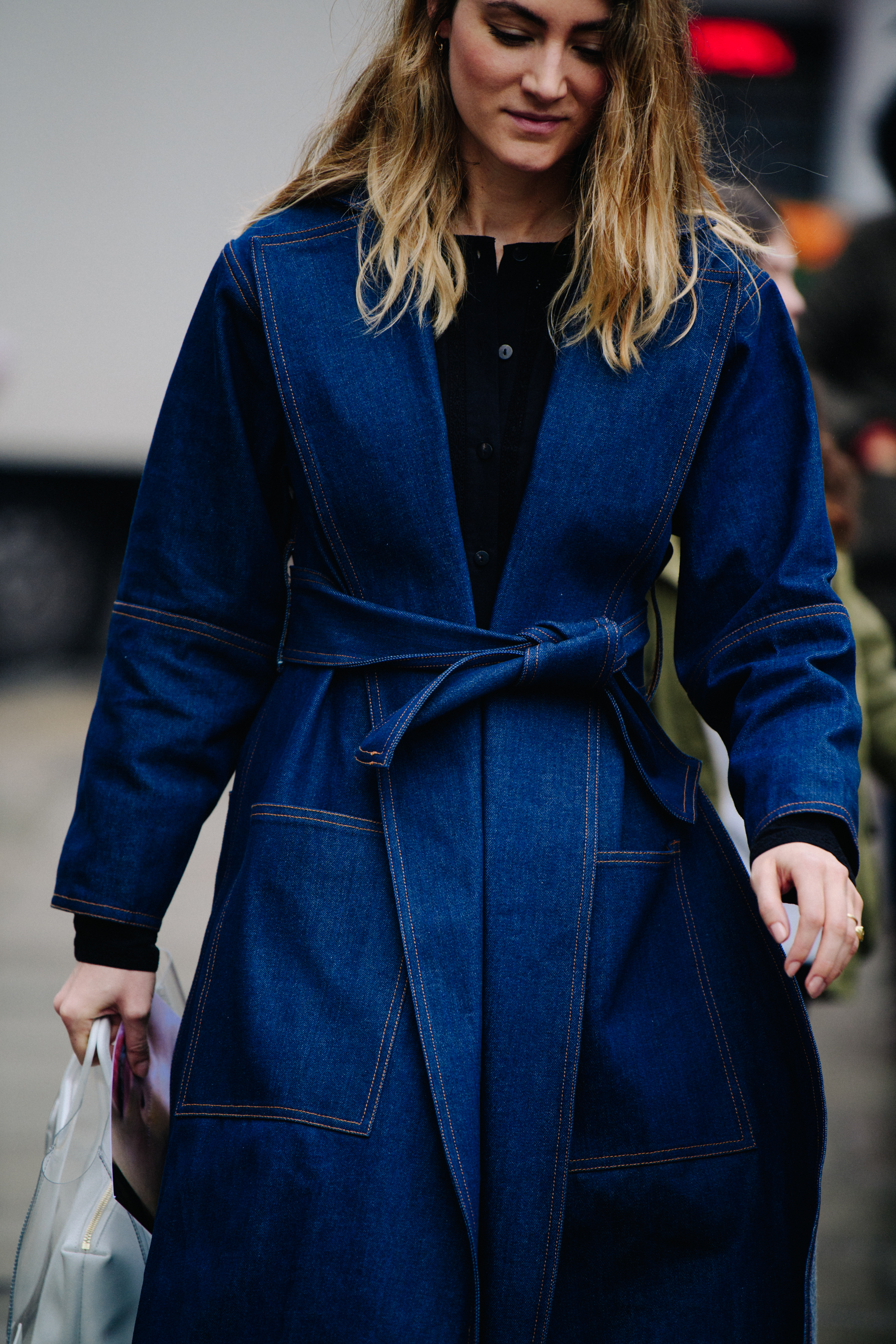 Woman wearing denim coat