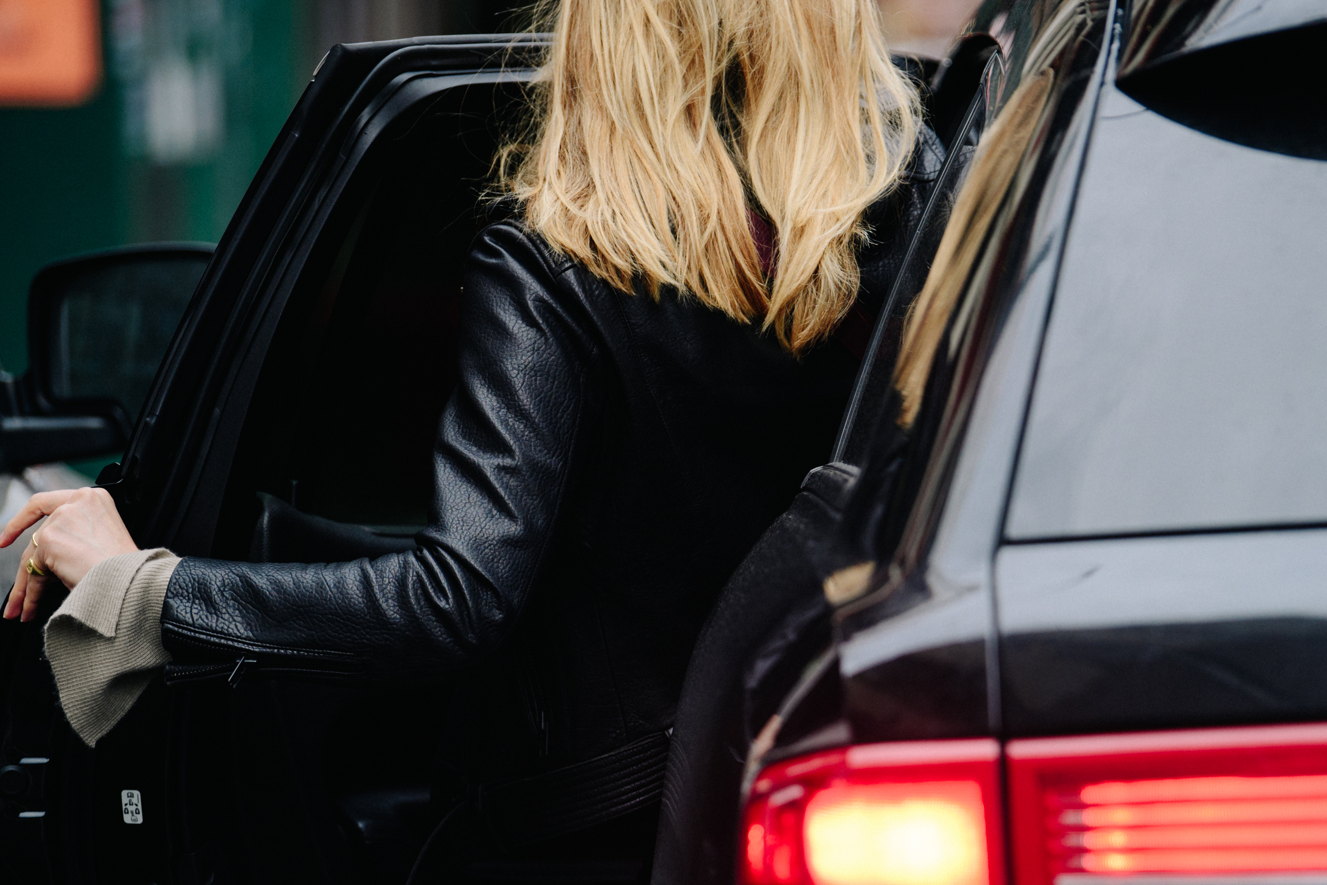 Woman wearing black leather jacket