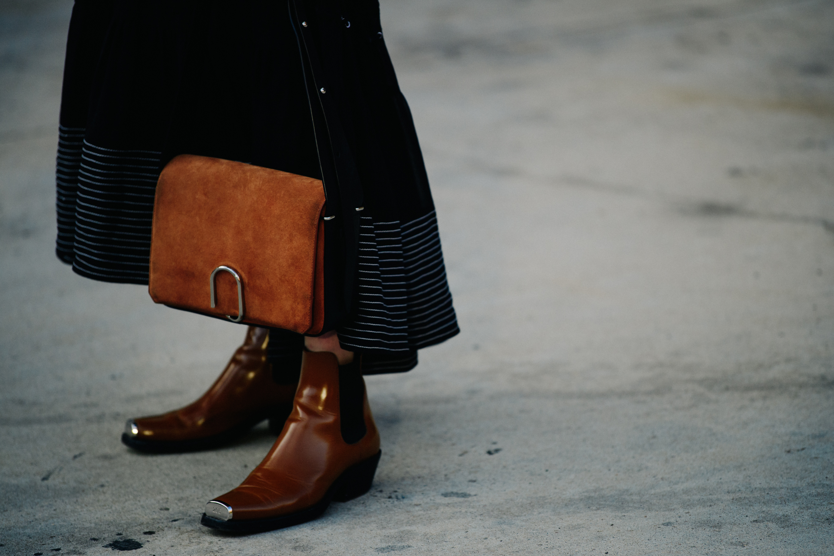 Woman wearing brown leather boots