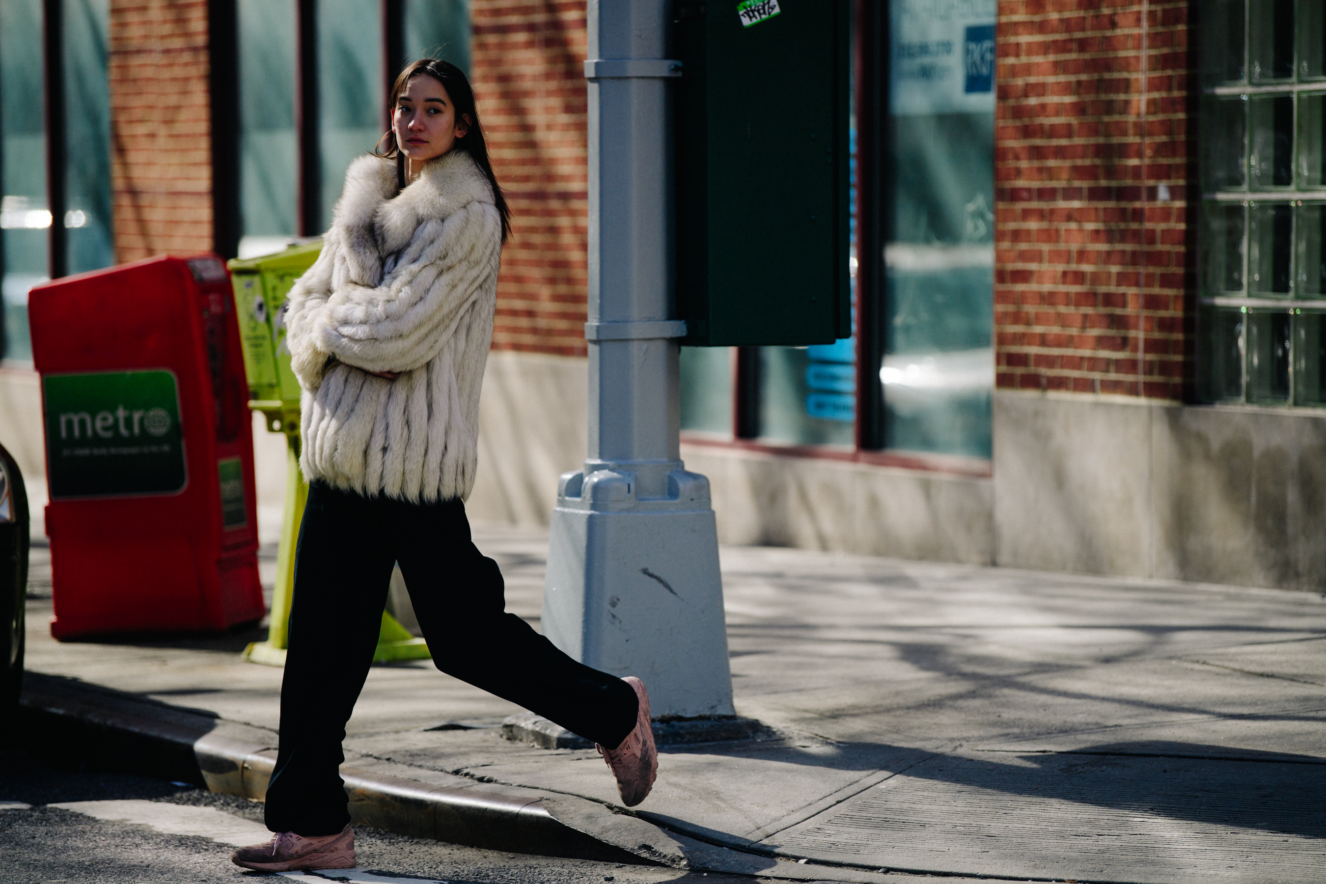 Model wearing light fur coat