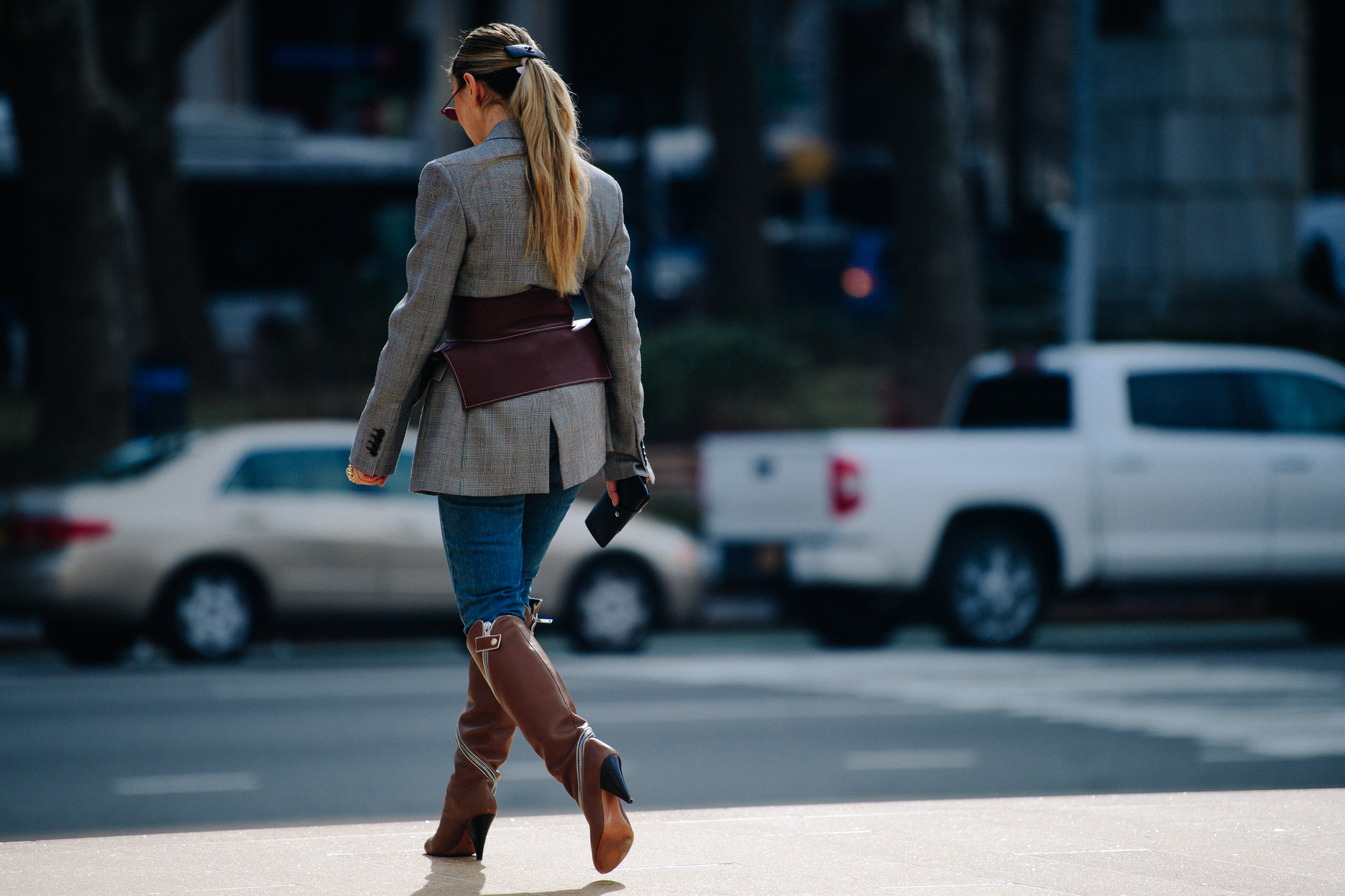 Woman wearing high brown boots