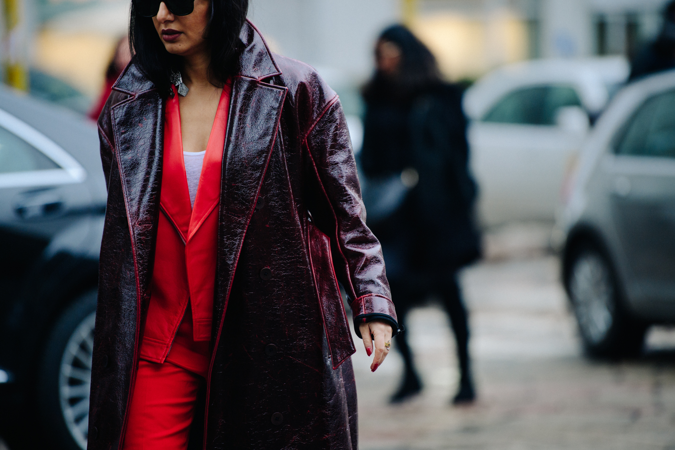 Woman wearing red blazer and pants