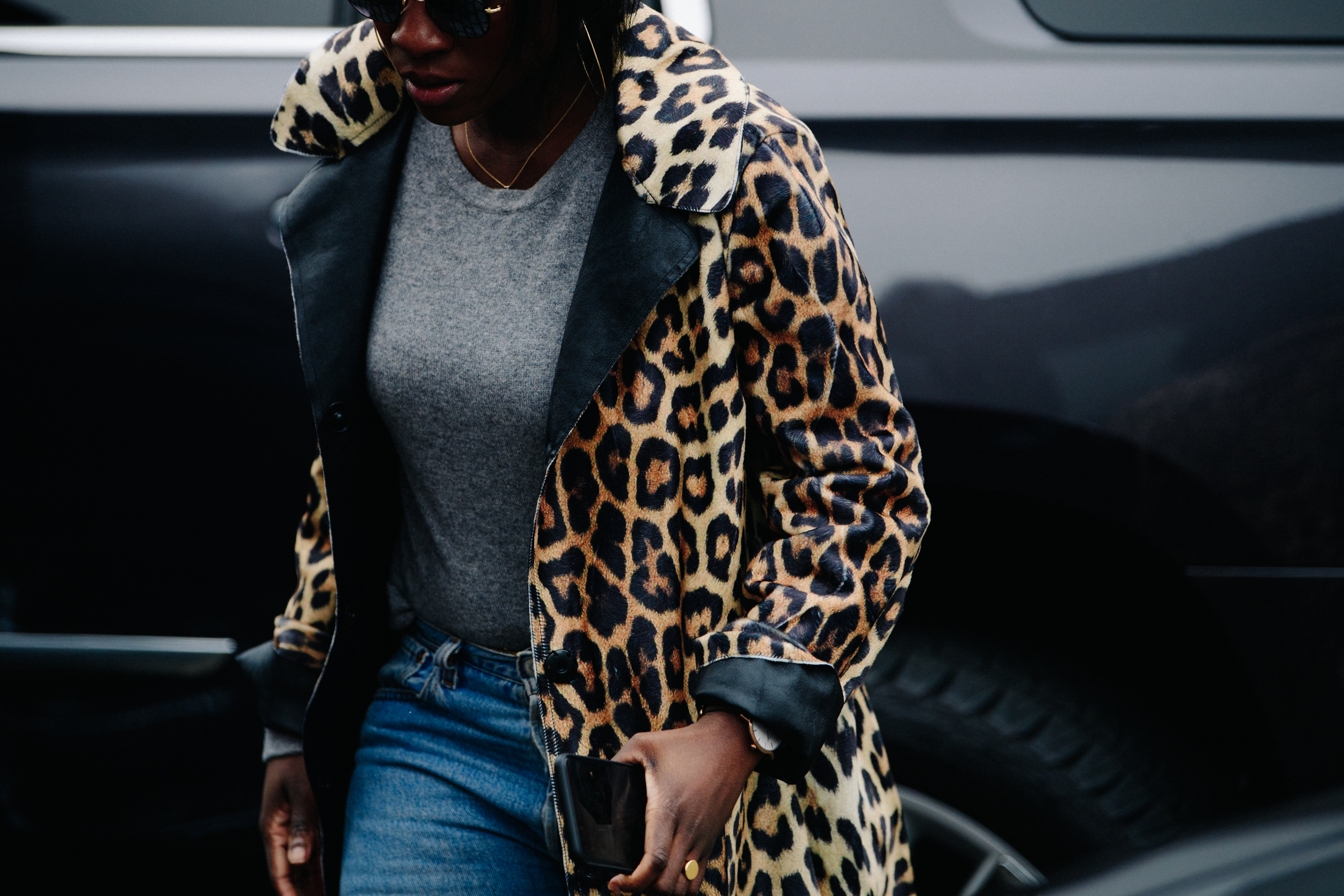 Woman wearing animal print coat