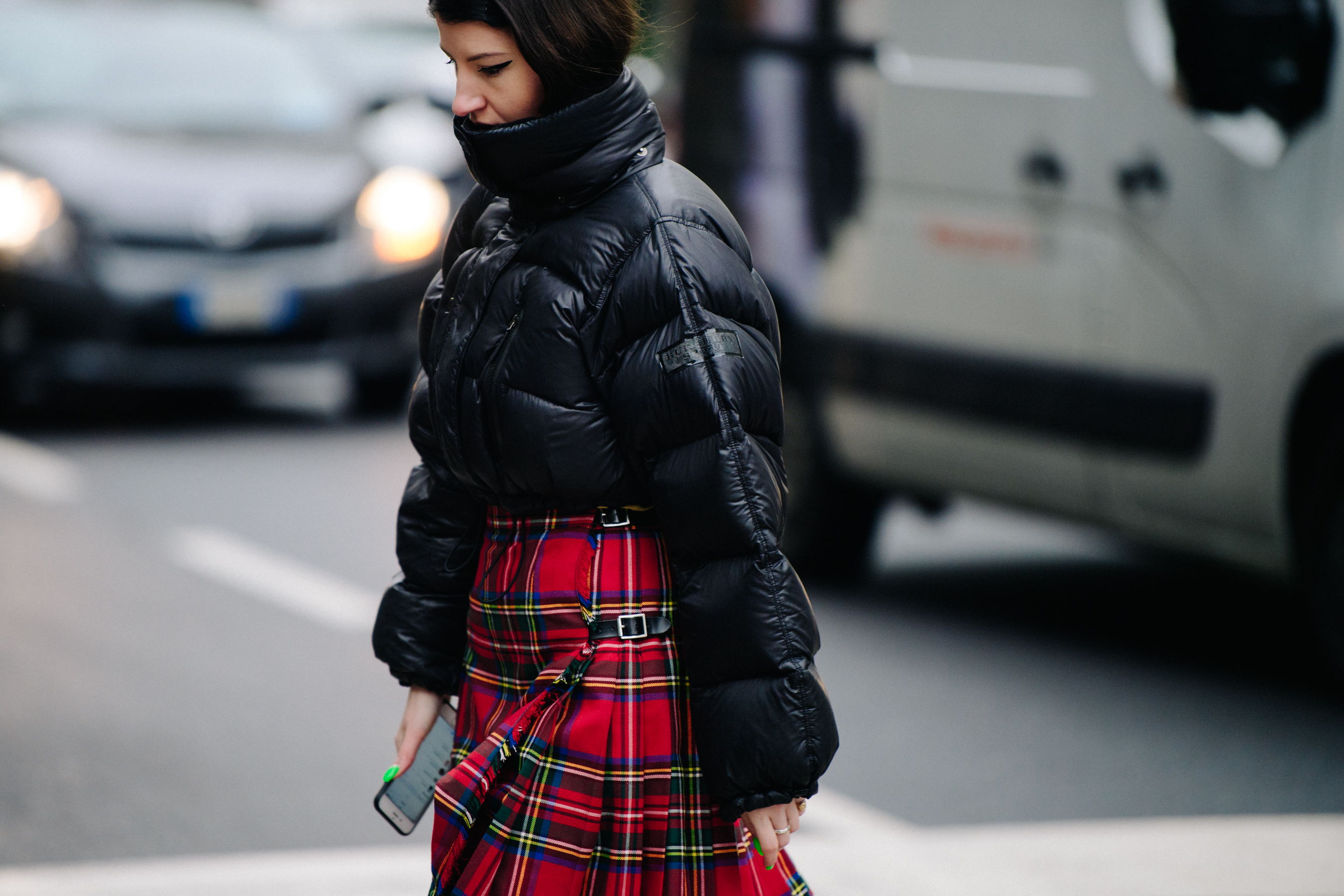 English woman wearing tartan skirt