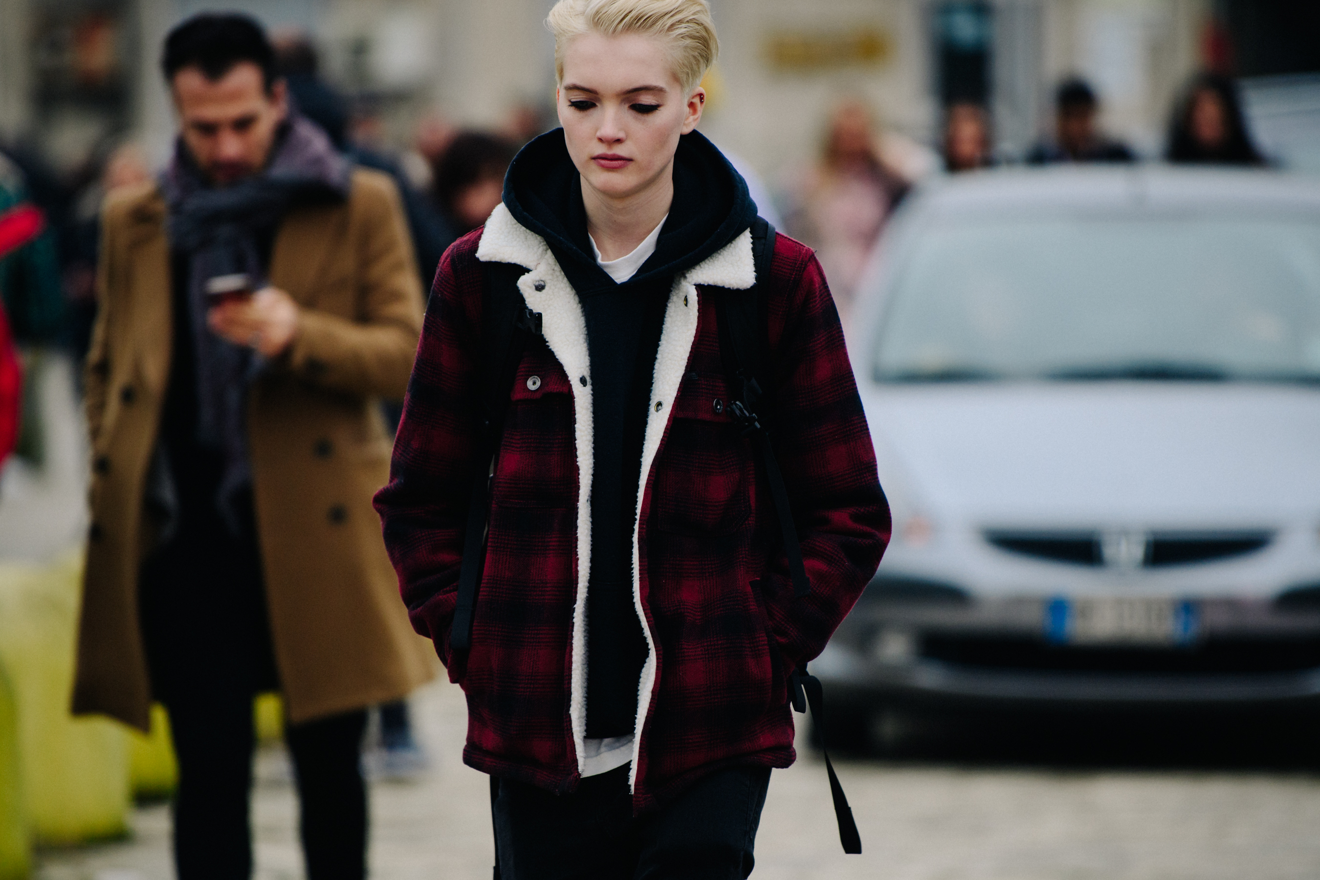 British model wearing red check shirt