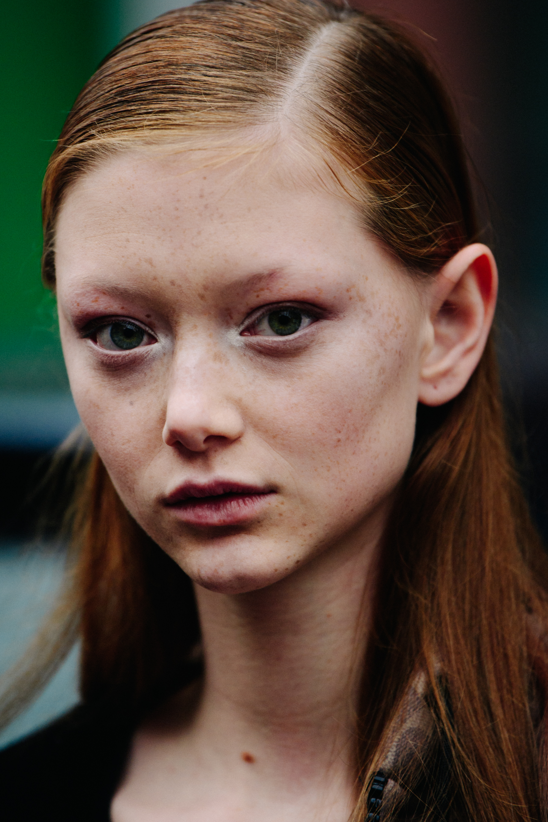 Portrait of model with long ginger hair