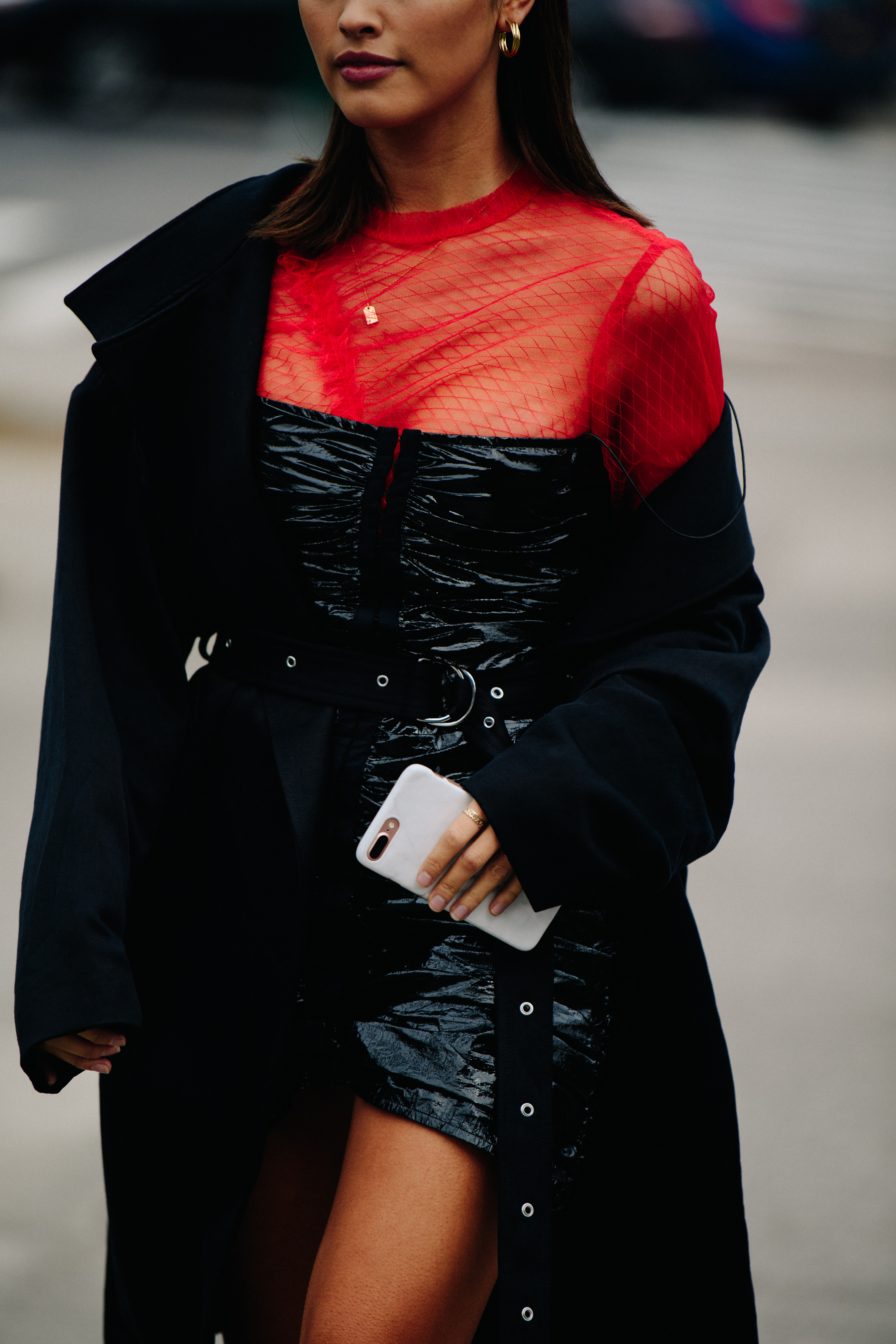 Woman wearing red and black corset dress