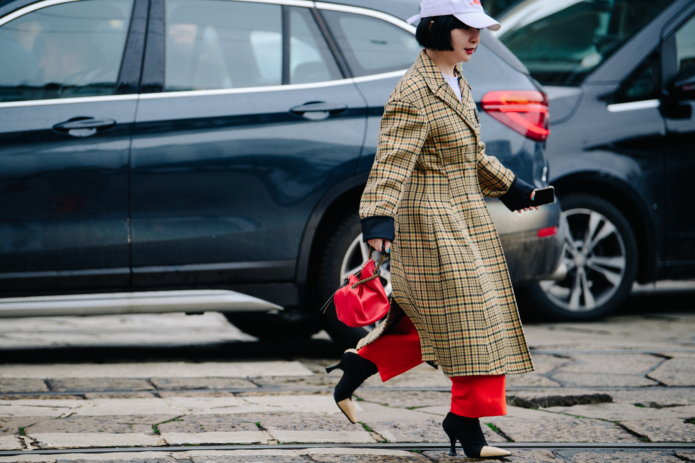 Asian woman wearing red pants