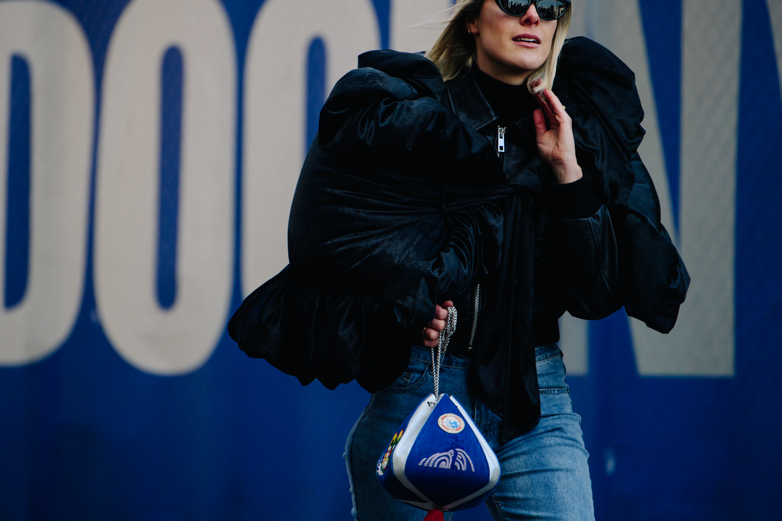 Woman wearing black leather jacket