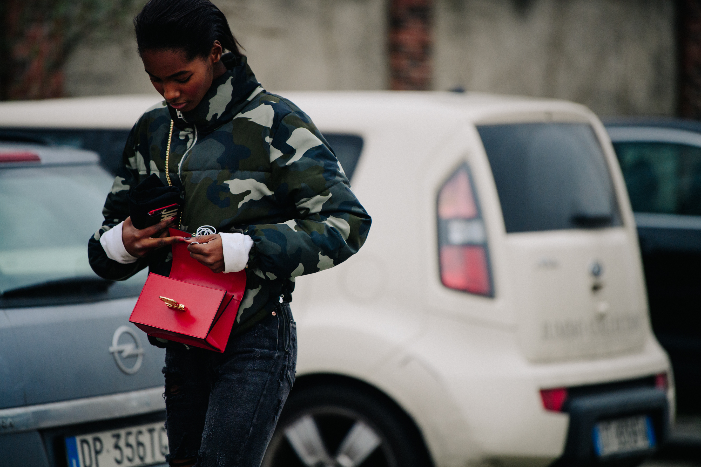 Model wearing camouflage jacket