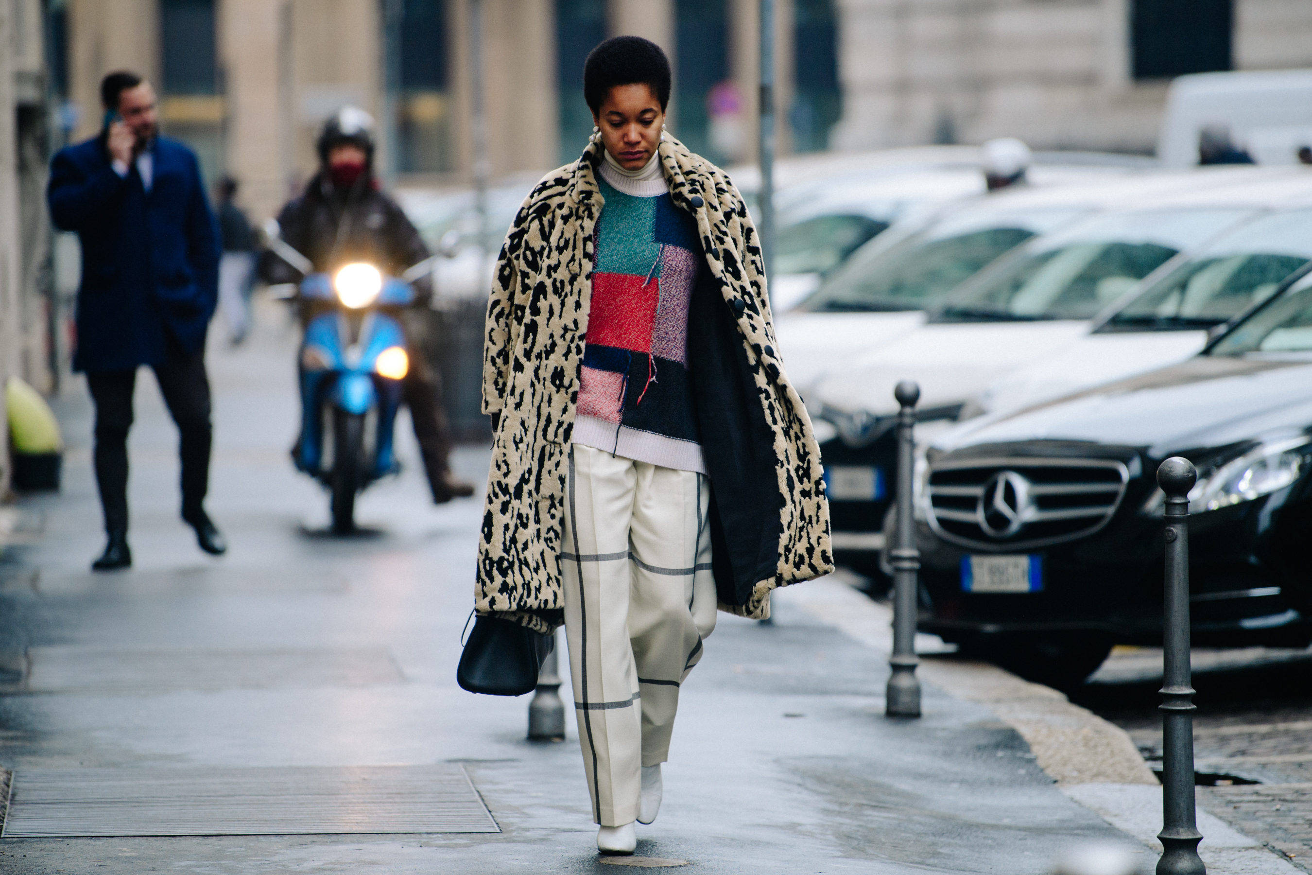 Woman wearing animal print coat