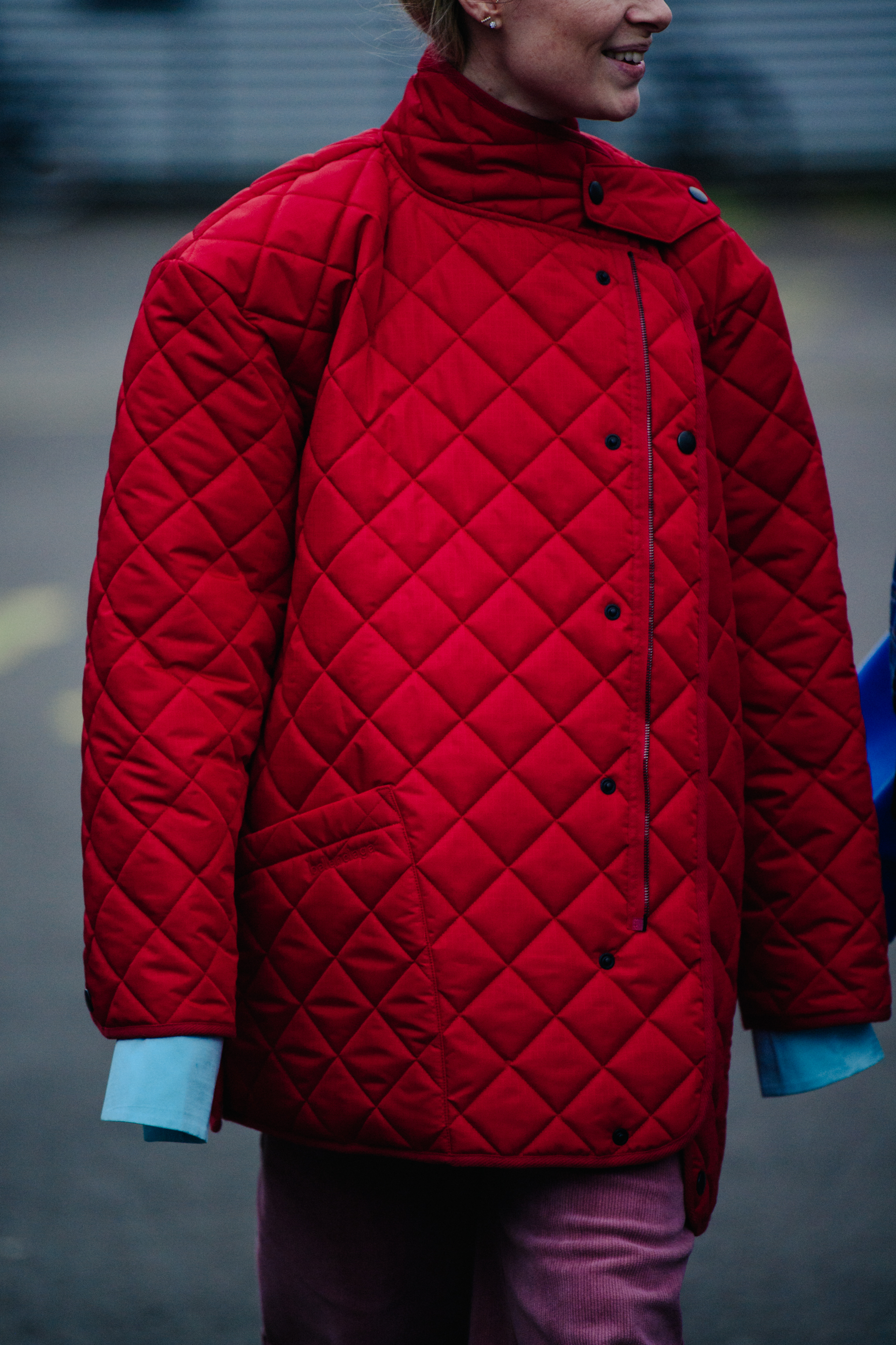 Danish woman wearing quilted red jacket