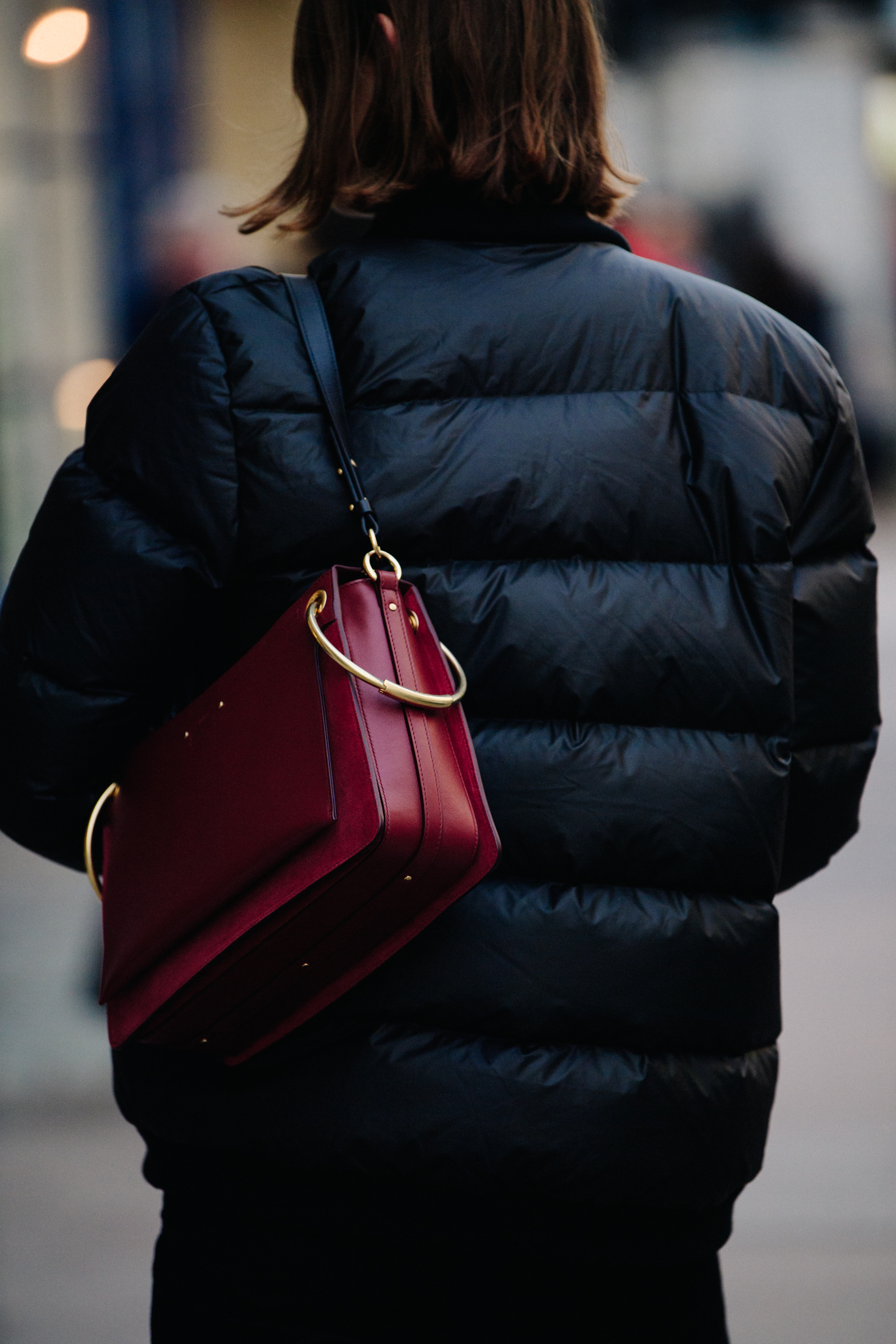 Woman carrying red Chloe bag