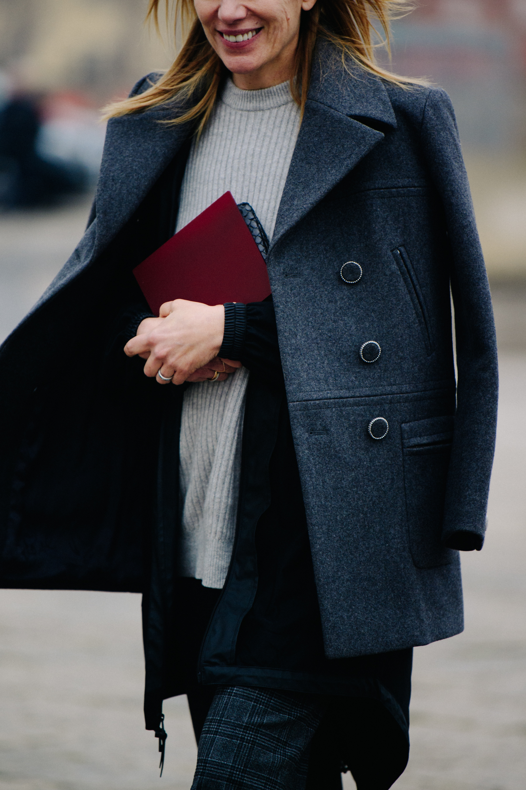 Woman wearing grey wool coat