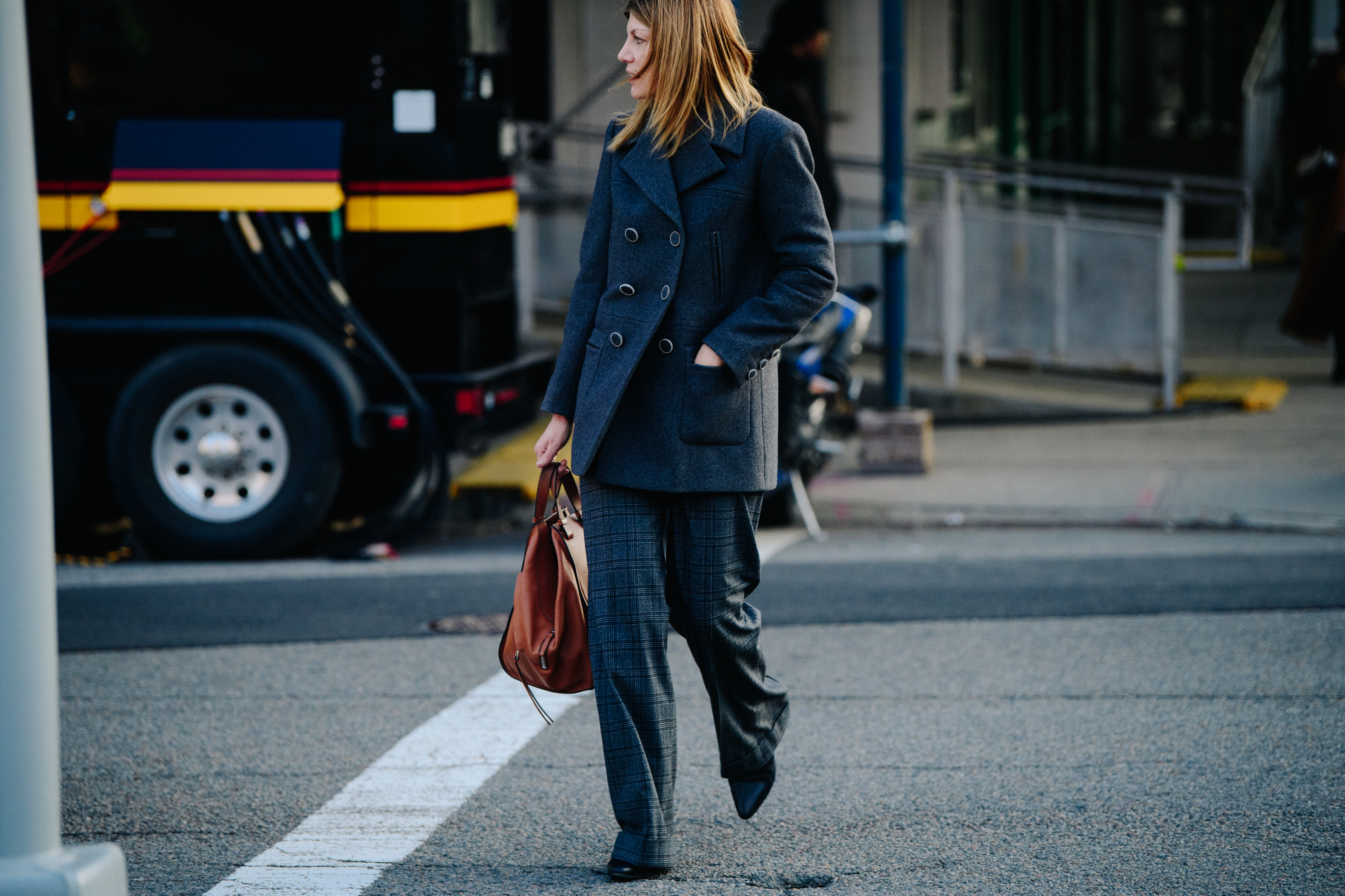 Woman wearing grey wool coat