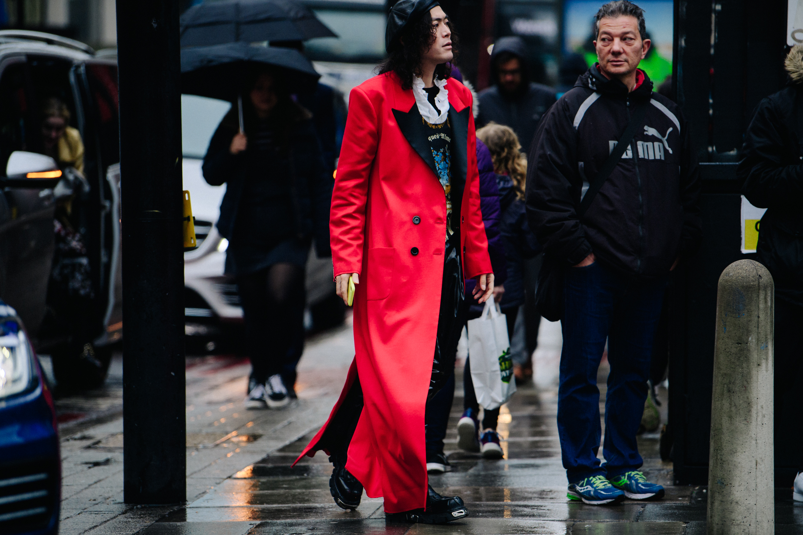 Japanese man wearing long red coat