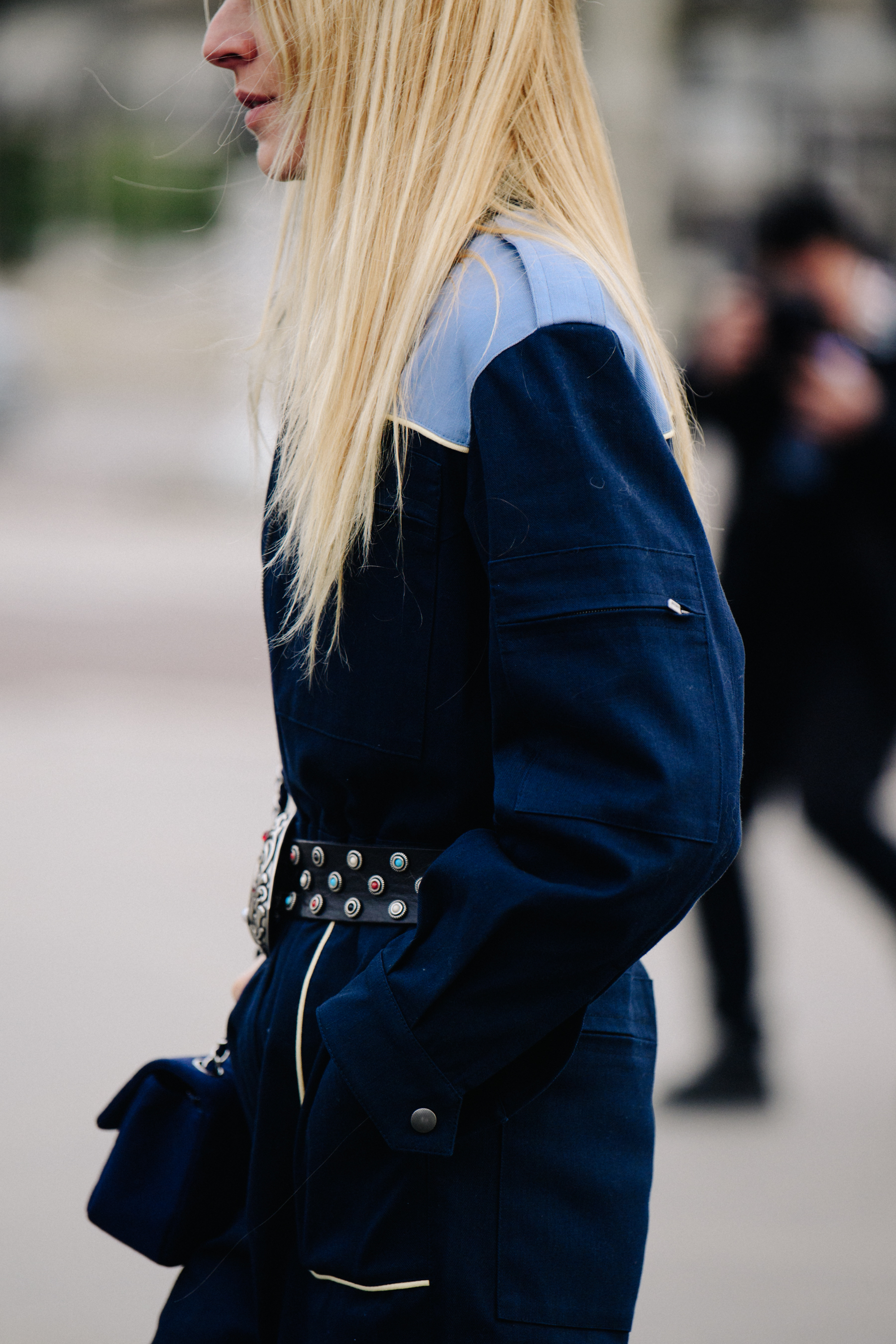 Woman wearing green denim jumpsuit