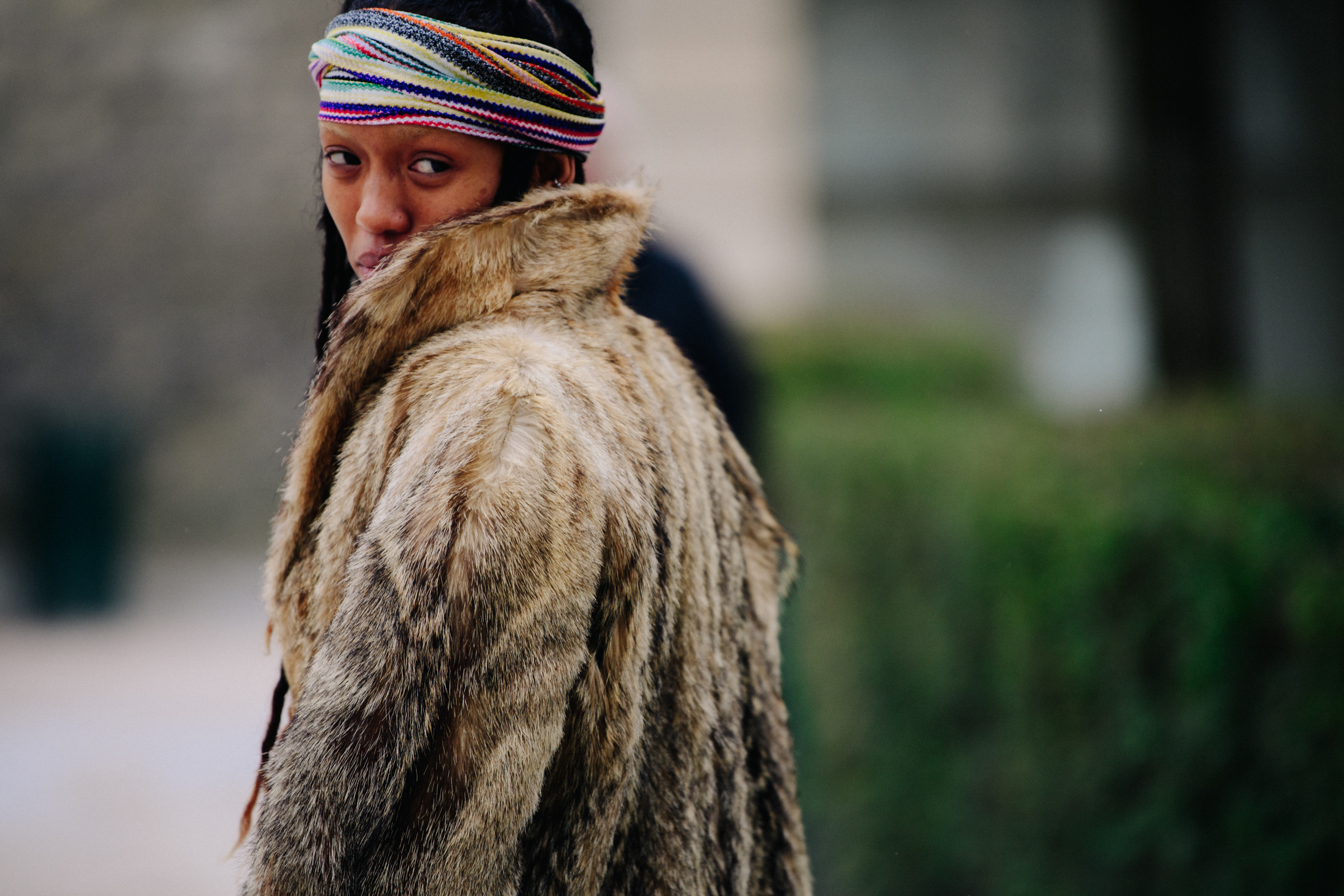 Model wearing brown fur coat