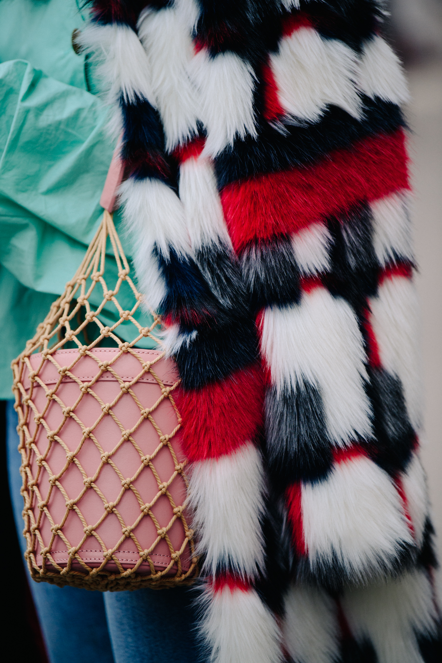 Woman carrying pink handbag