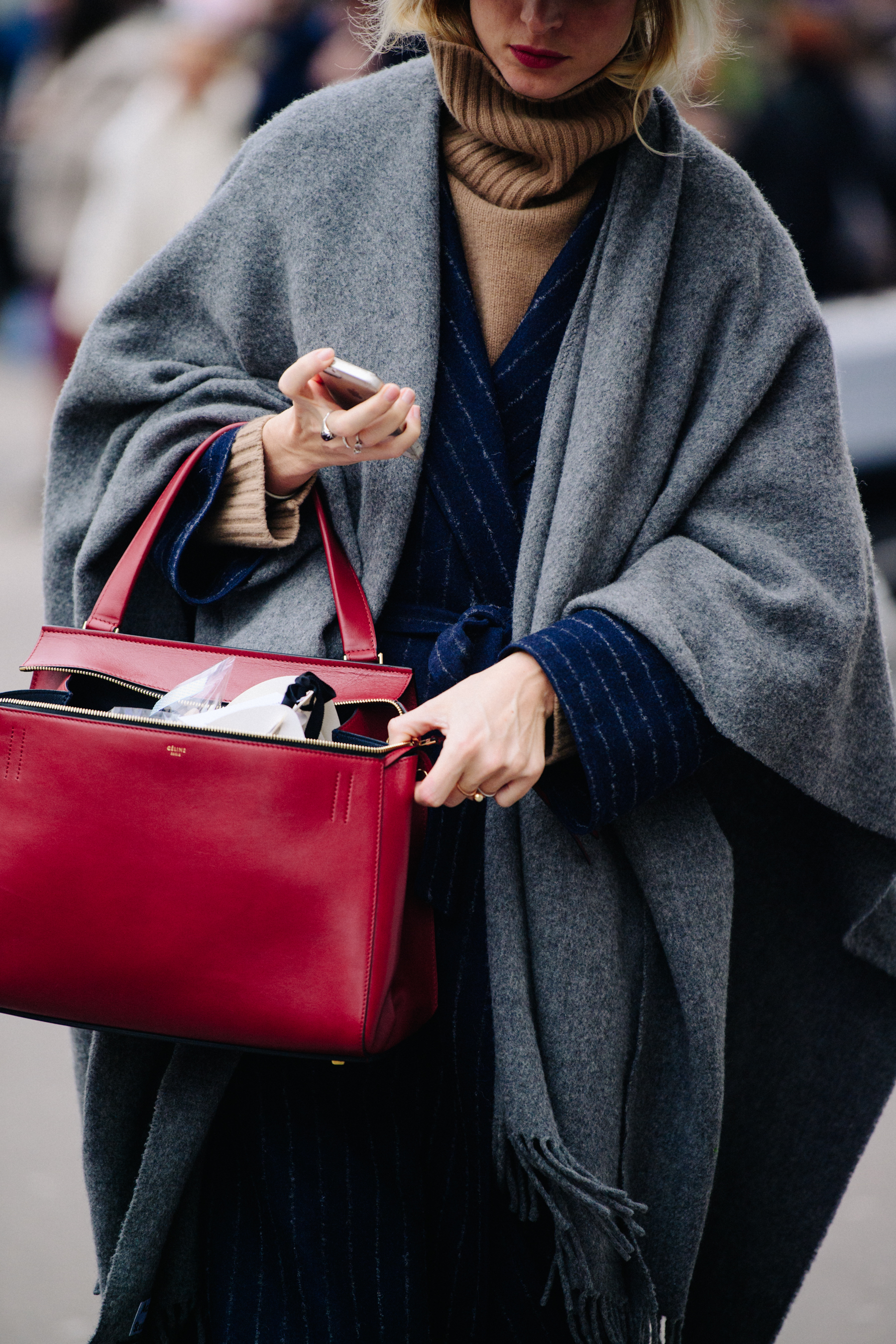 Woman carrying red Celine bag