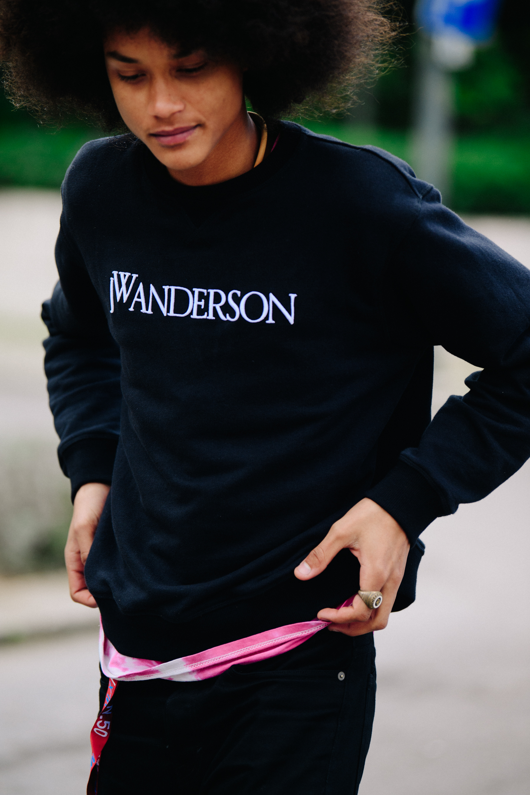 Male model wearing JW Anderson jumper