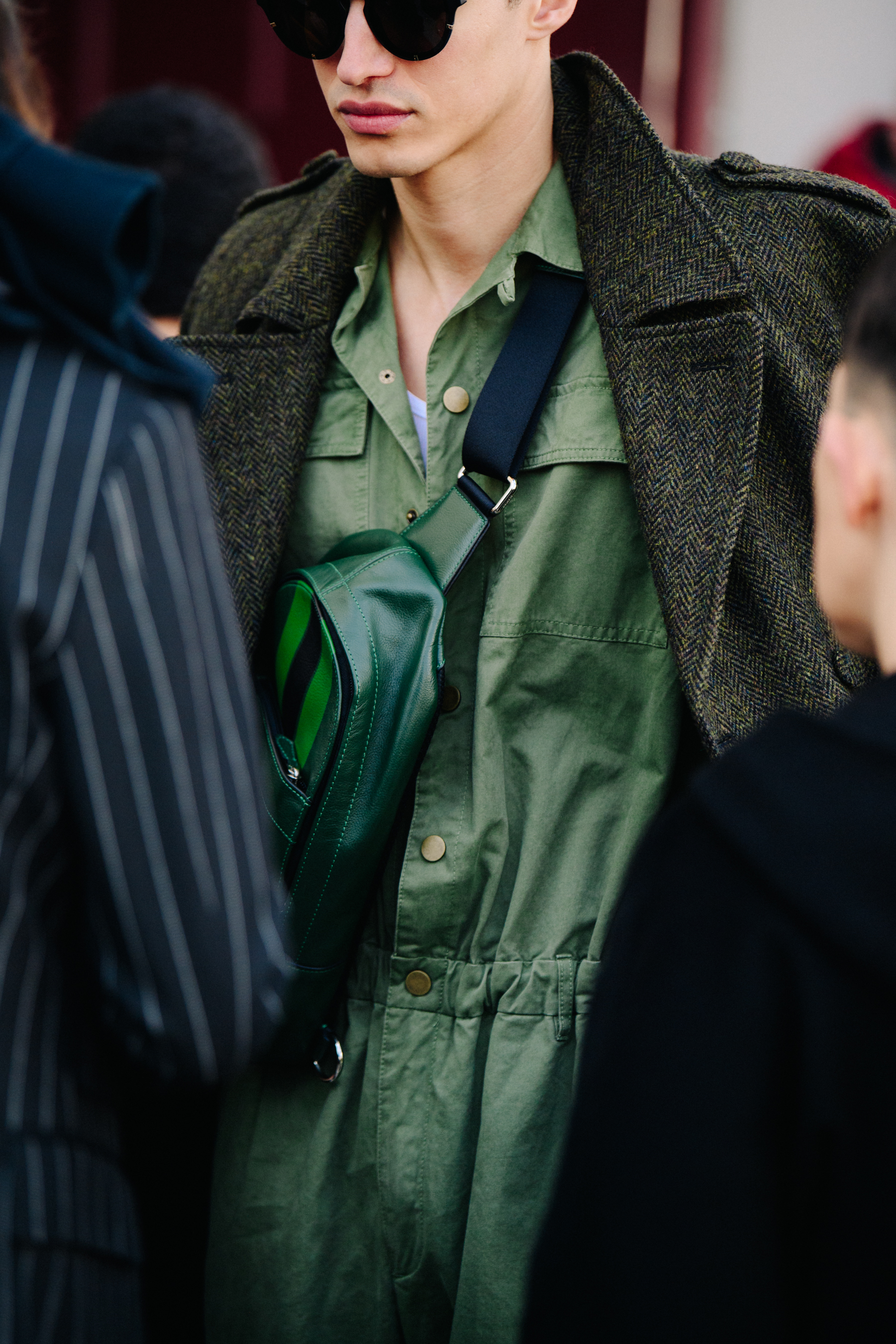 Man wearing green military overalls