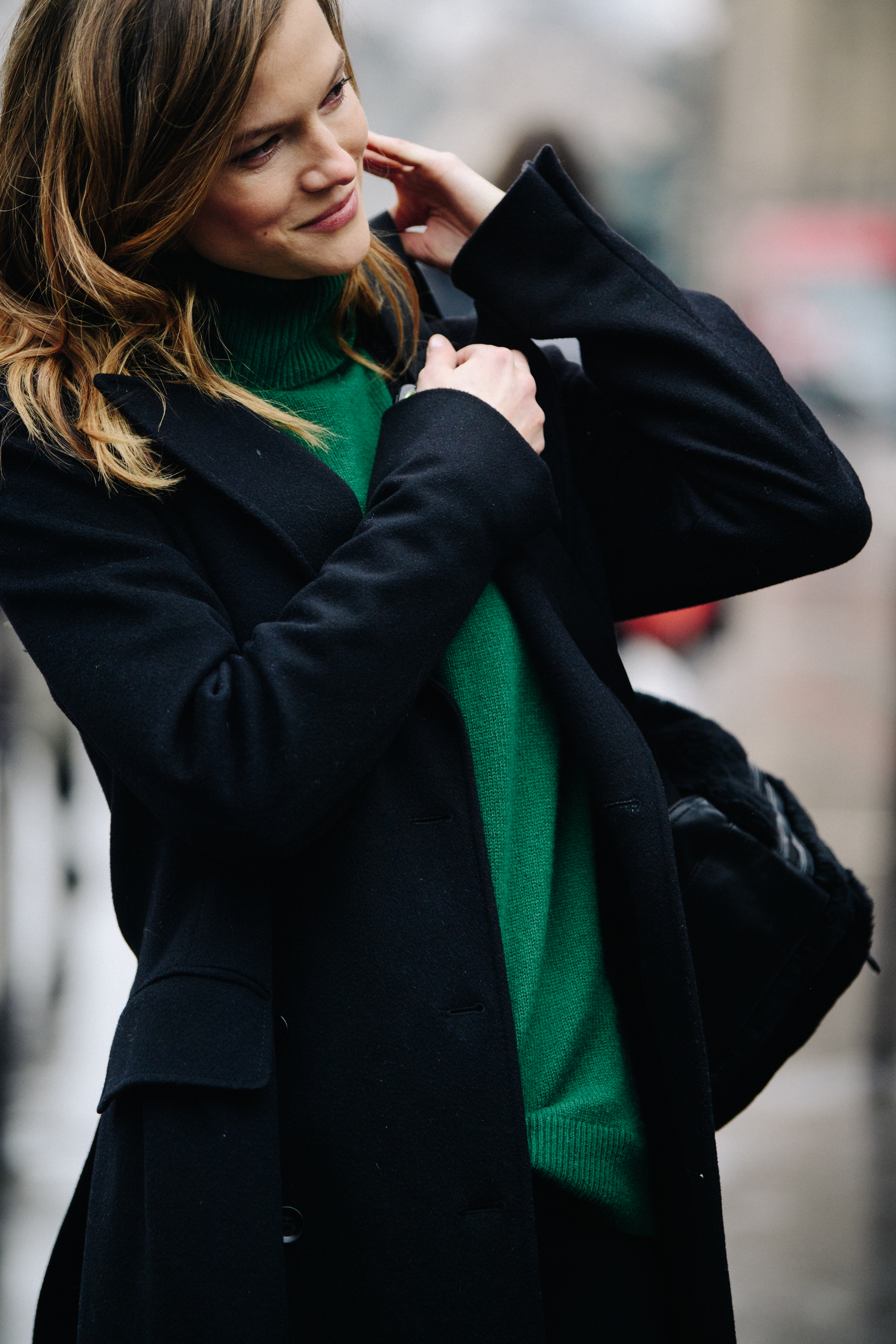 Model wearing green knit jumper