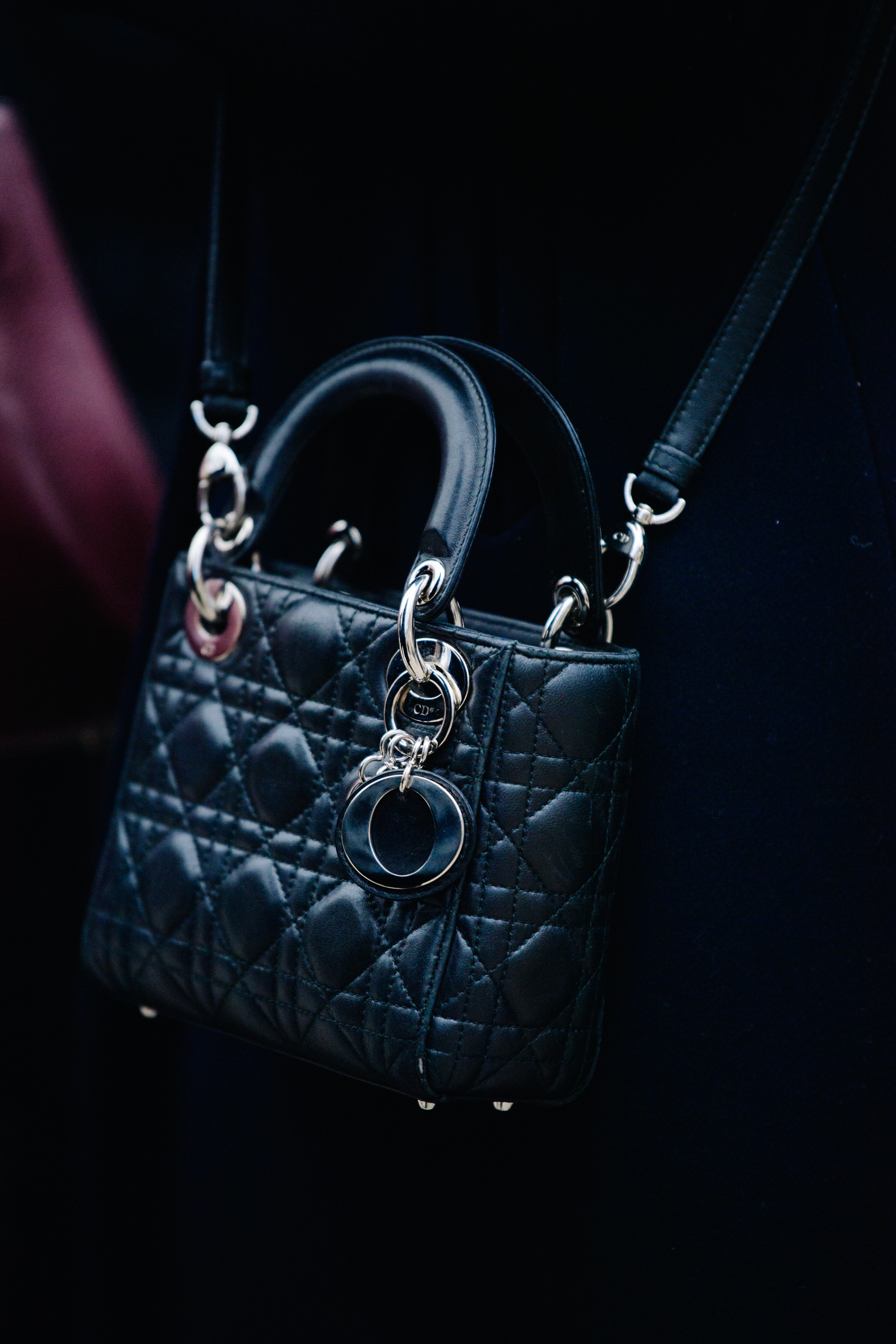Woman carrying Dior bag