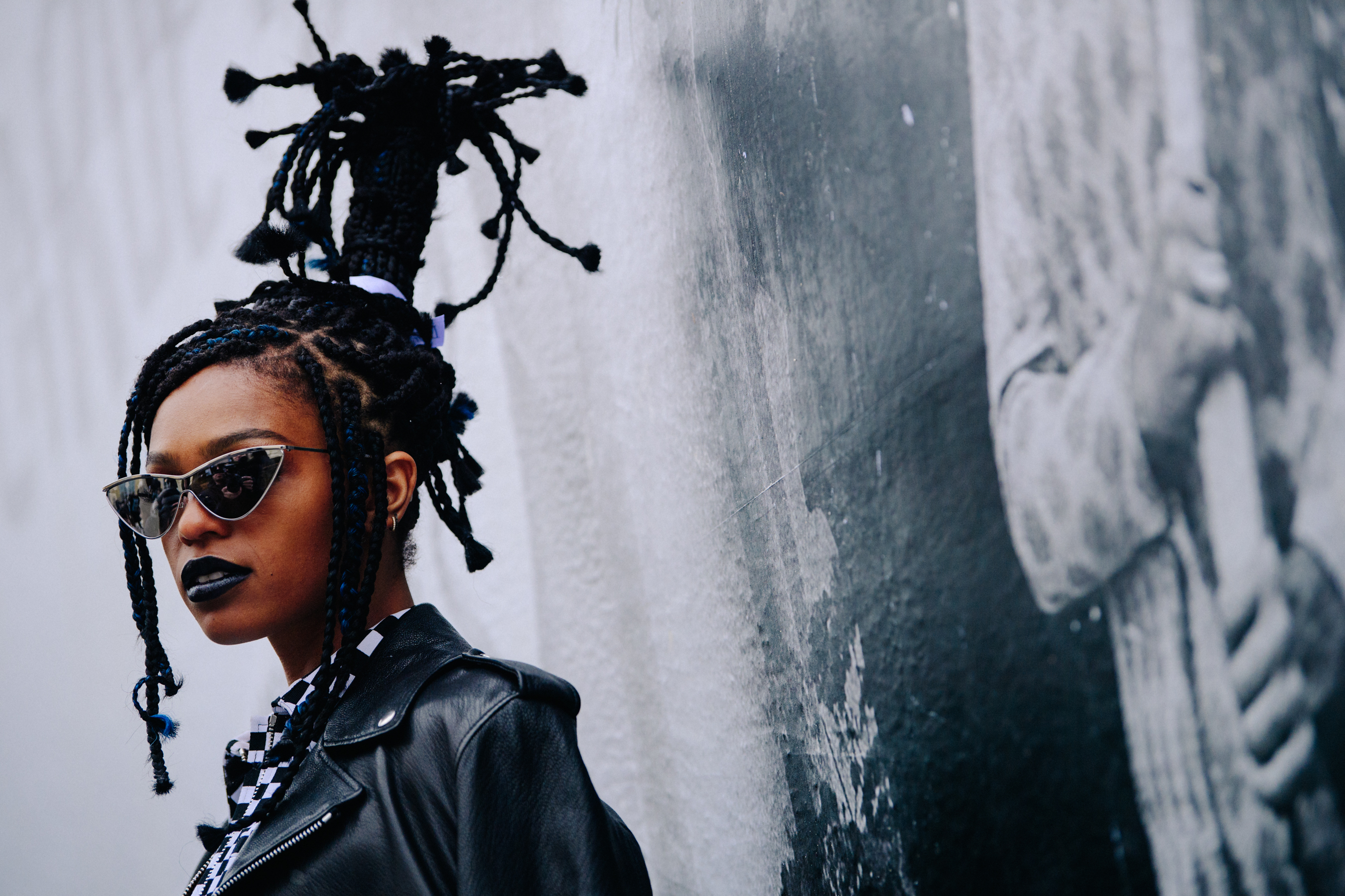 Woman with high tied braided hair