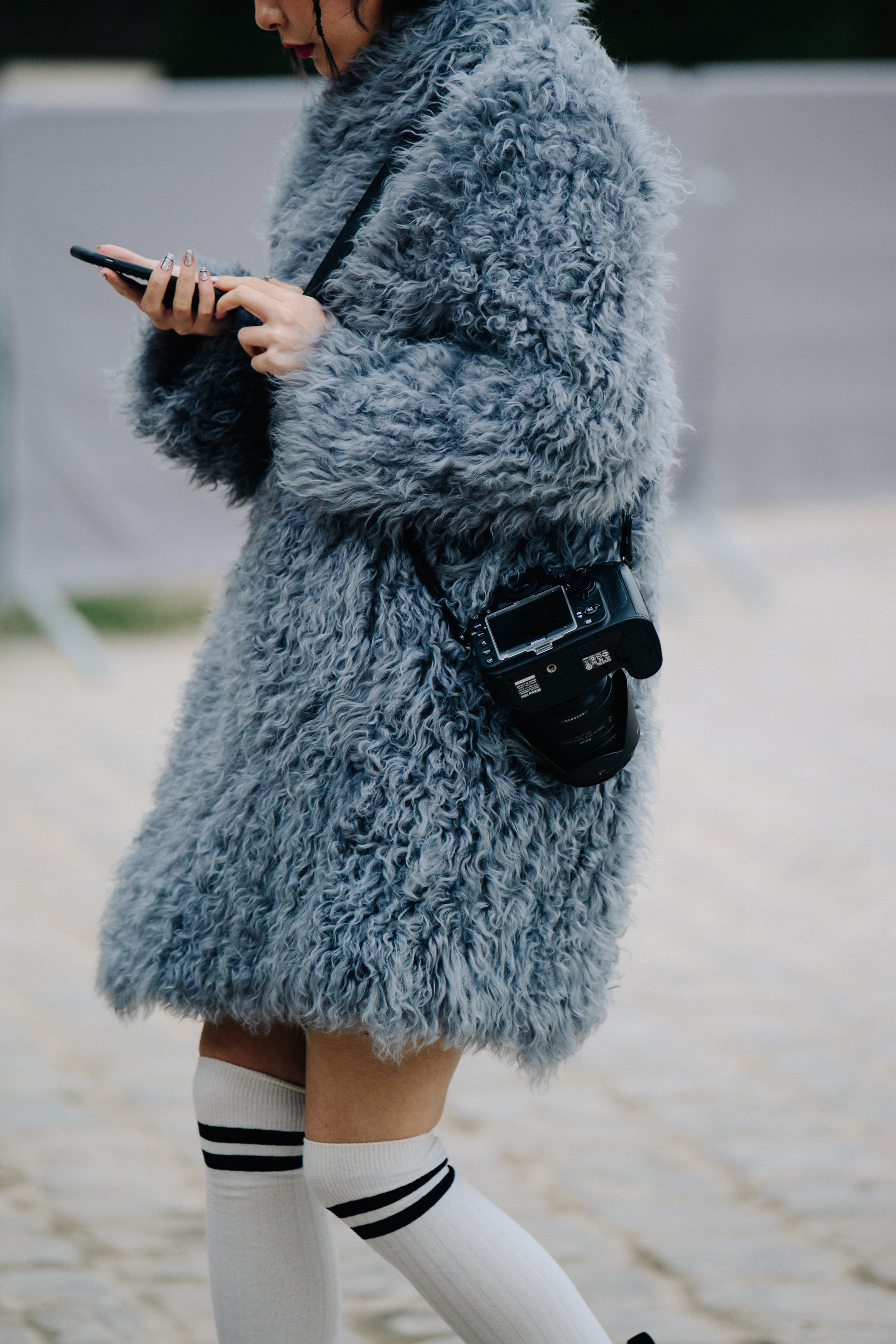 Woman wearing blue wool coat