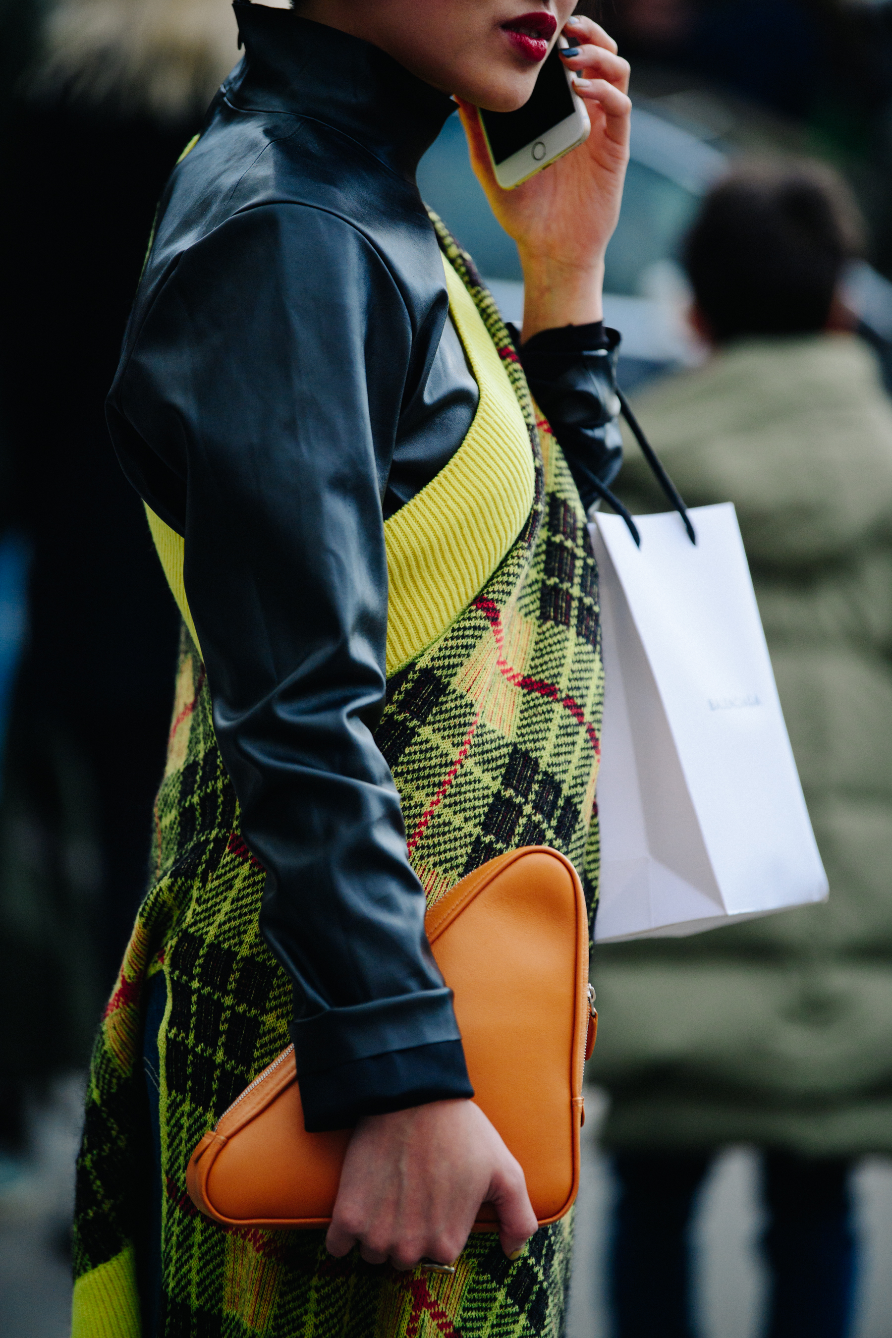 Woman wearing yellow check top